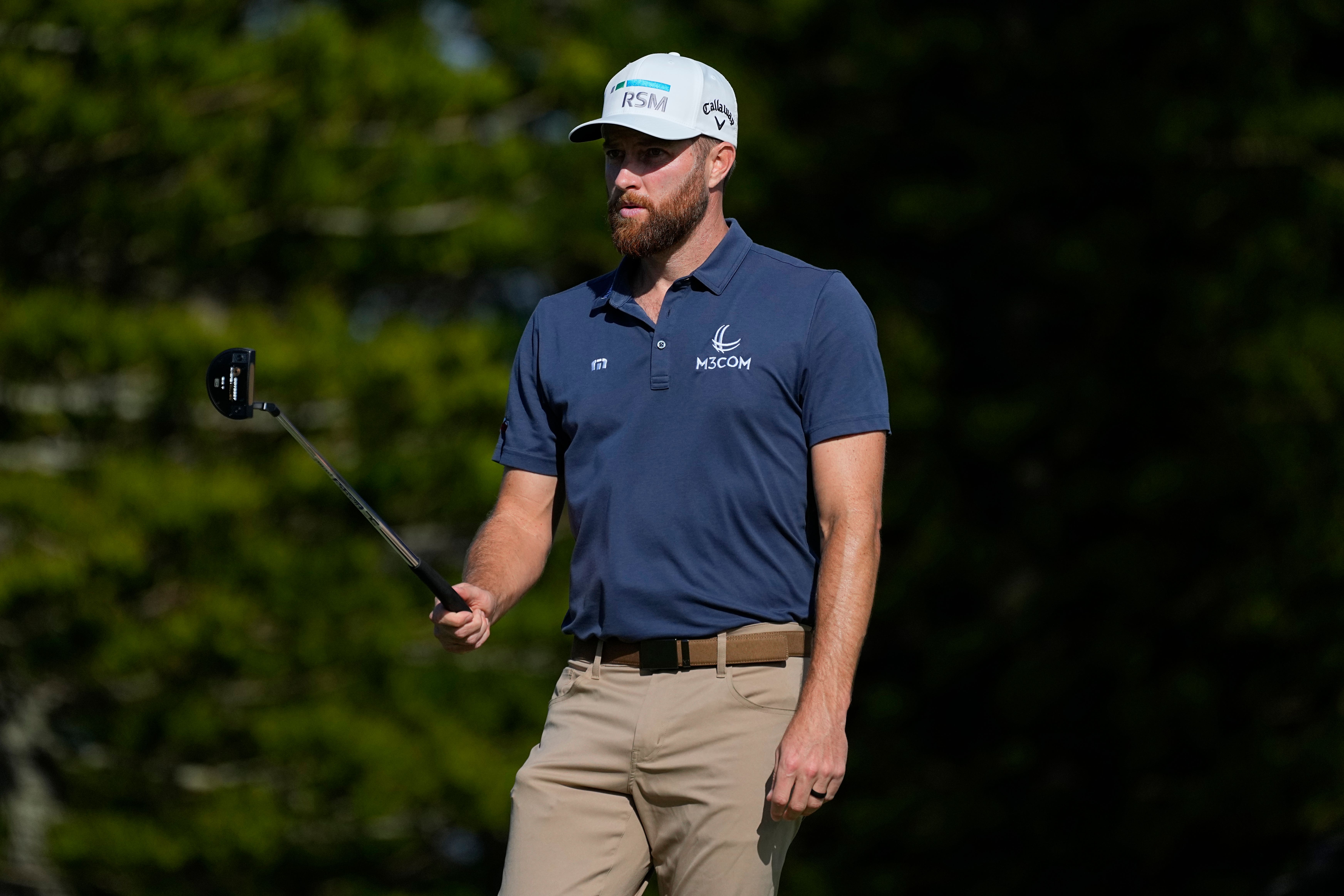 Chris Kirk watches his shot on the second green during the third round of The Sentry (Matt York, AP)