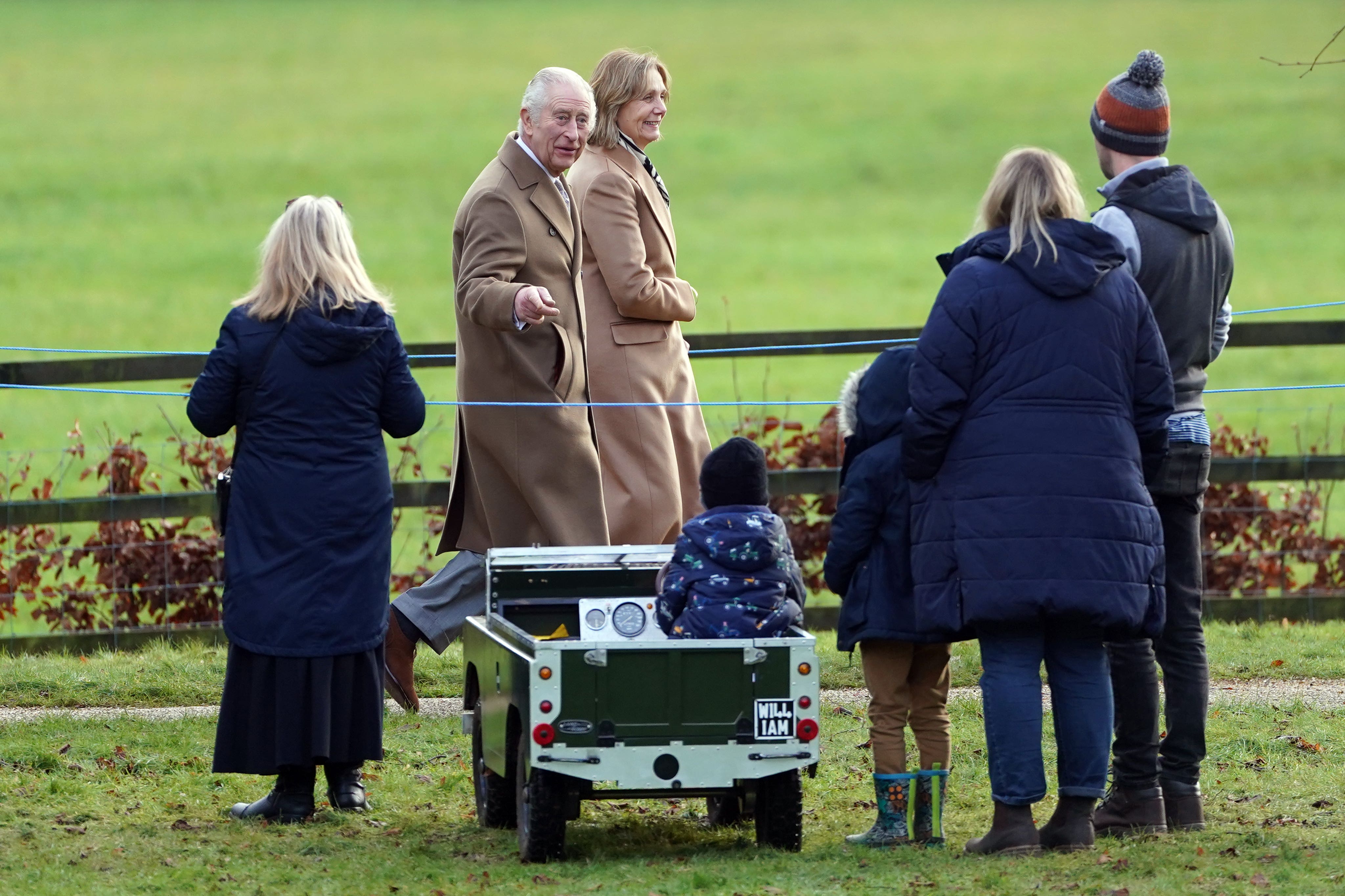 King Charles talks to Simon and Georgina Ward and their sons William and Oliver (Joe Giddens/PA)