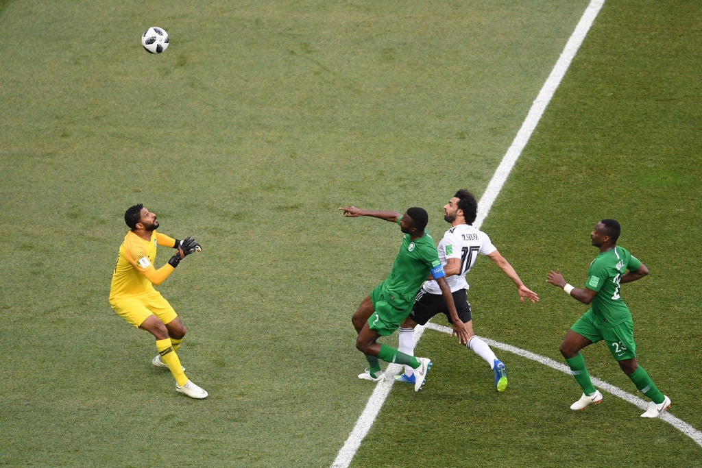 Salah lobs the Saudi Arabia goalkeeper to score for Egypt at the 2018 World Cup