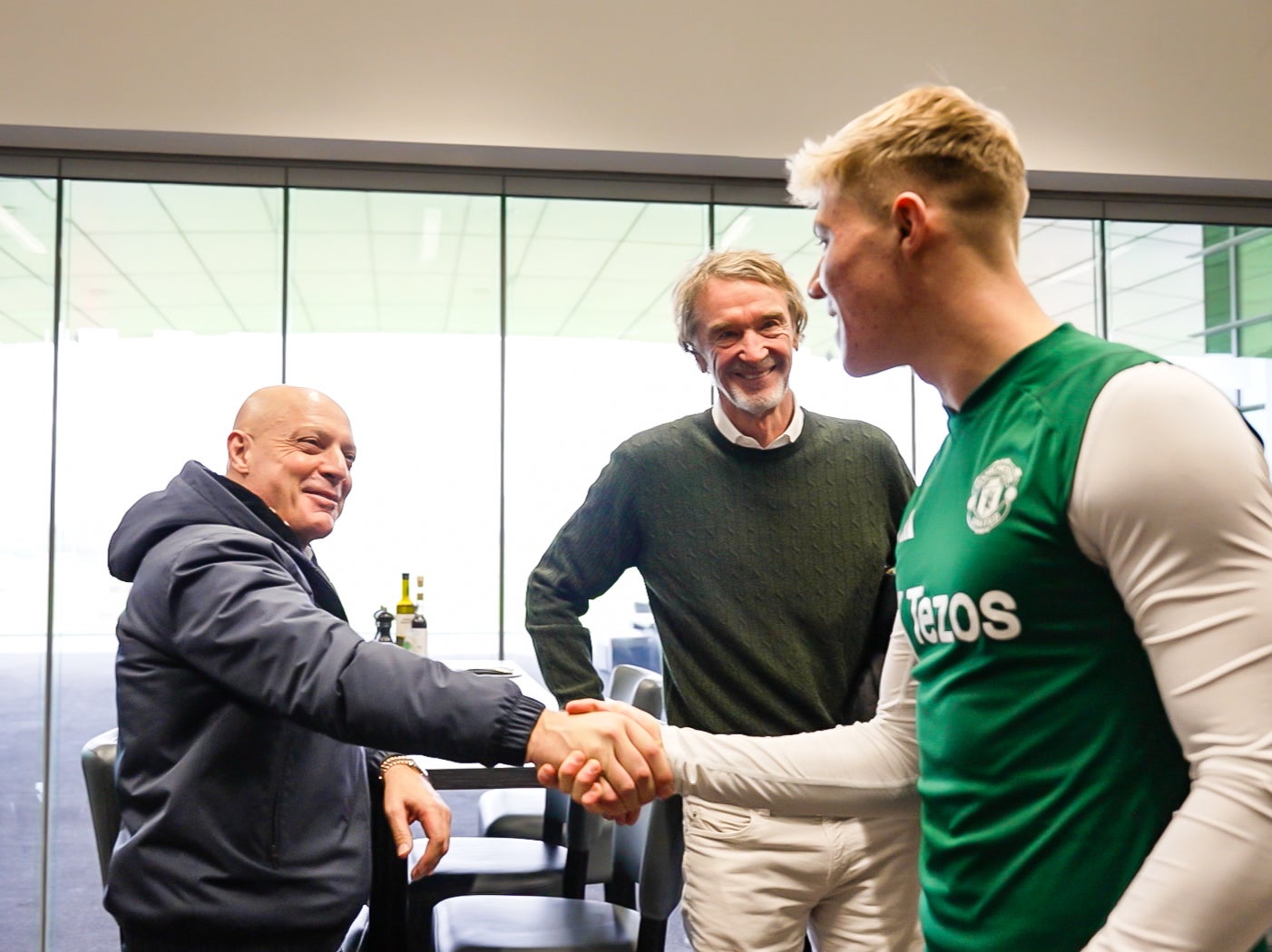 Sir Jim Ratcliffe and Sir Dave Brailsford of INEOS meet Rasmus Hojlund of Manchester United