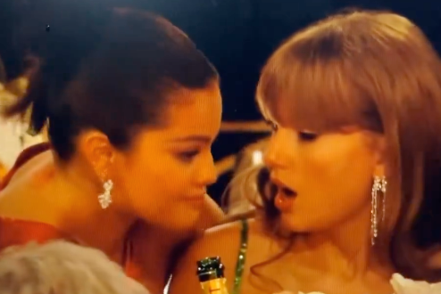 Selena Gomez talking to Taylor Swift at the Golden Globes