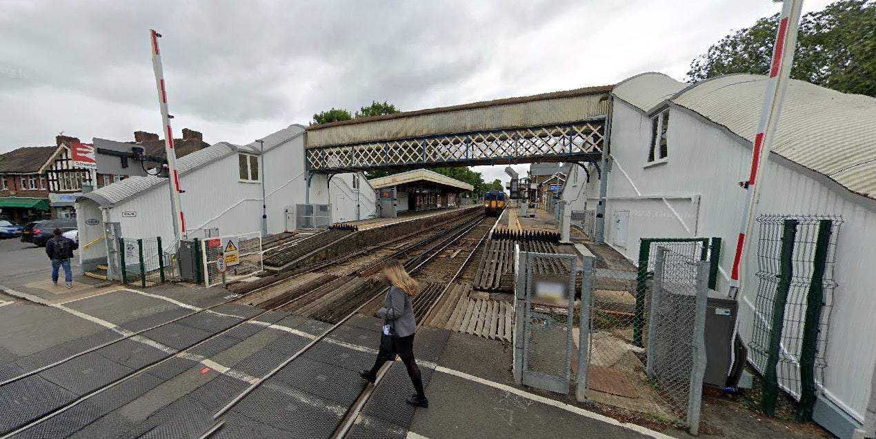 Four people were arrested after a man was found stabbed to death at Strawberry Hill station, Twickenham