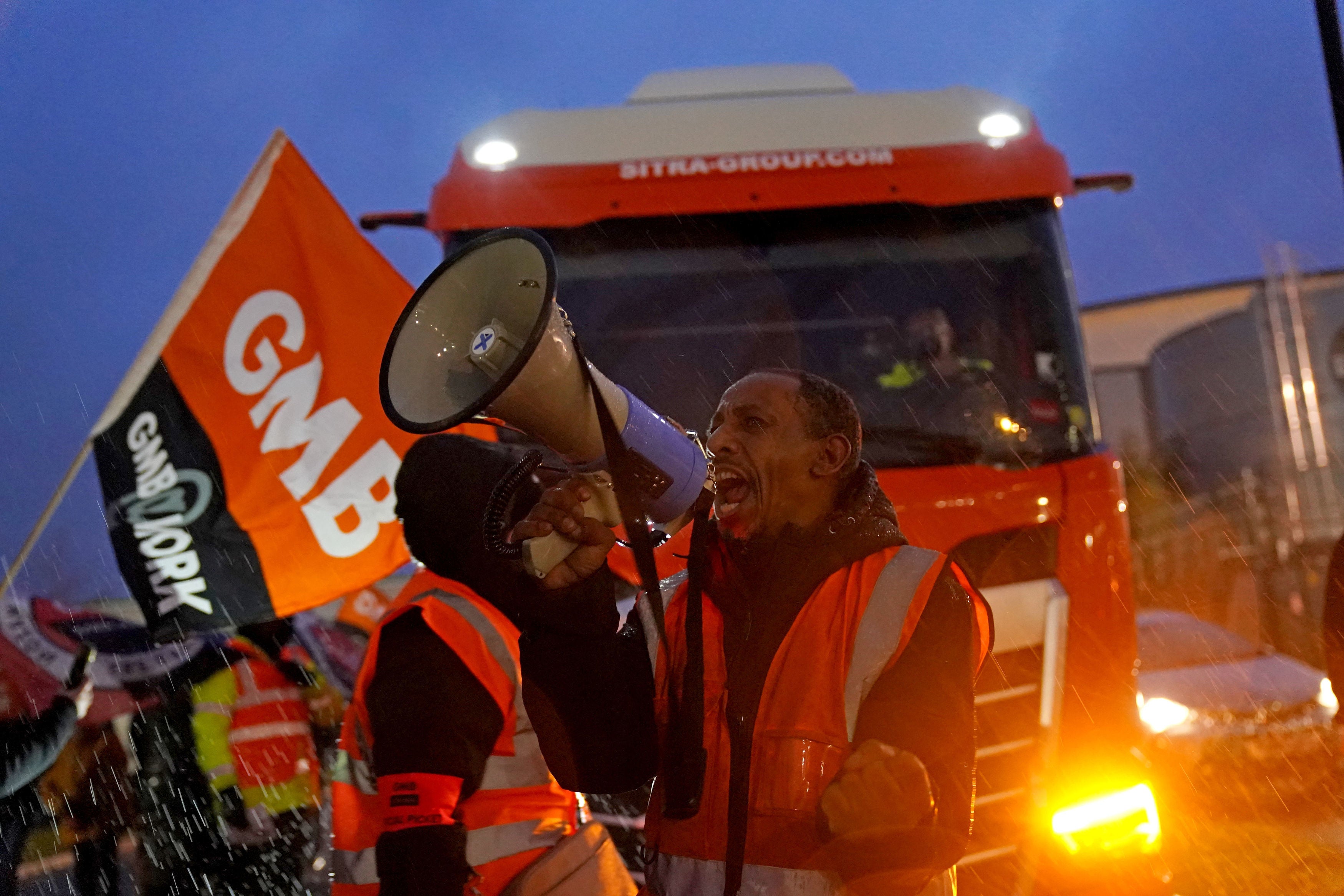 Amazon staff members on a GMB union picket line outside the online retailer's site in Coventry, as they take part in a strike in their long-running dispute over pay, held on Black Friday