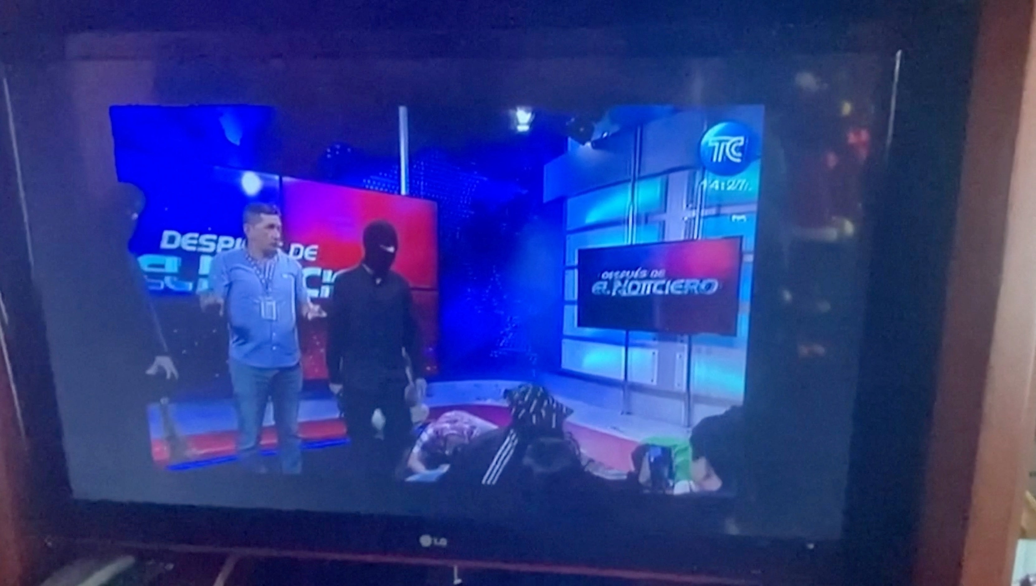 The masked men stormed the studio before the feed was cut