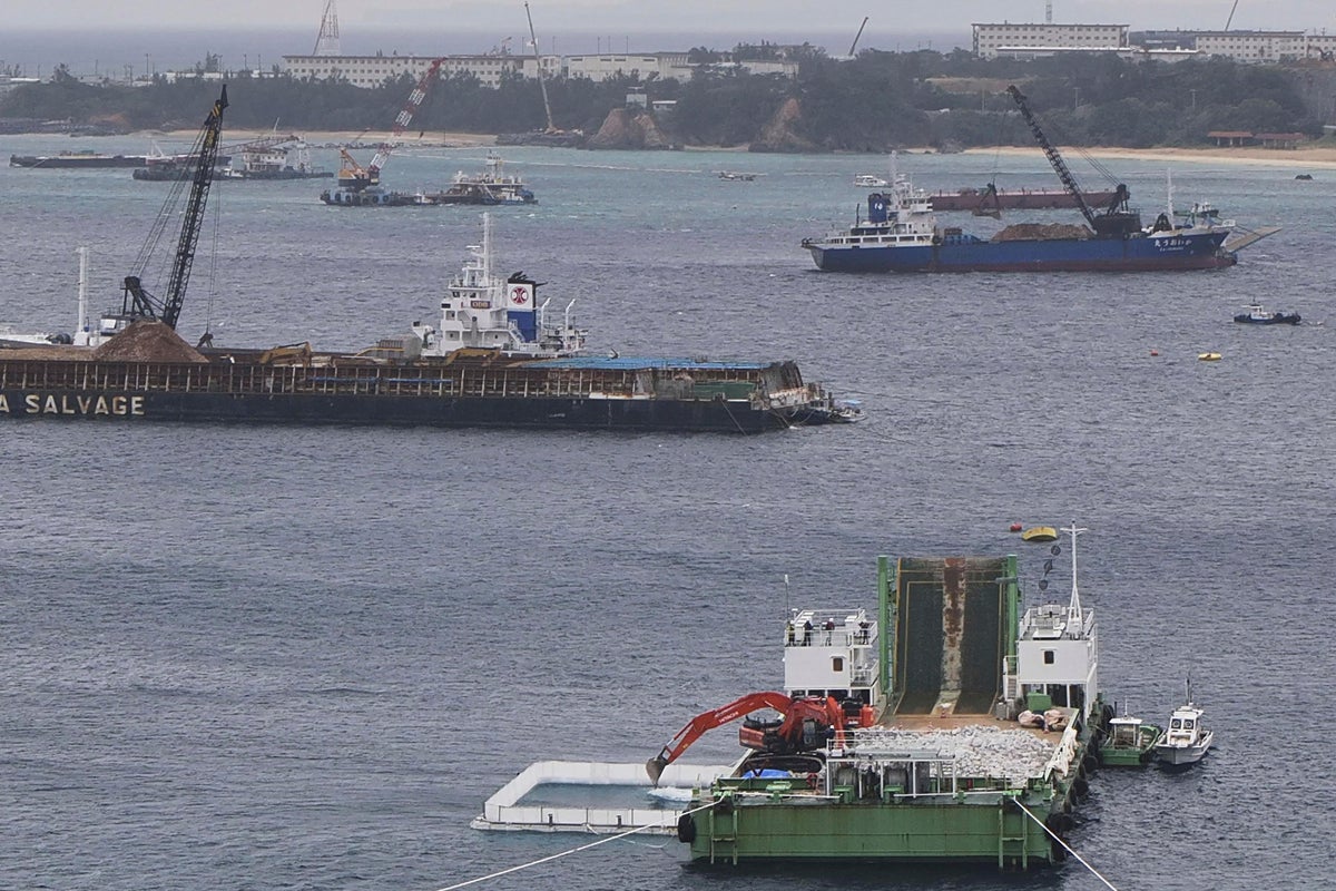 Two dead after boats carrying students capsize off US base construction site in Japan
