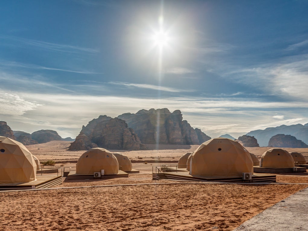Hunker down under the stars in a dune-side Bedouin tent