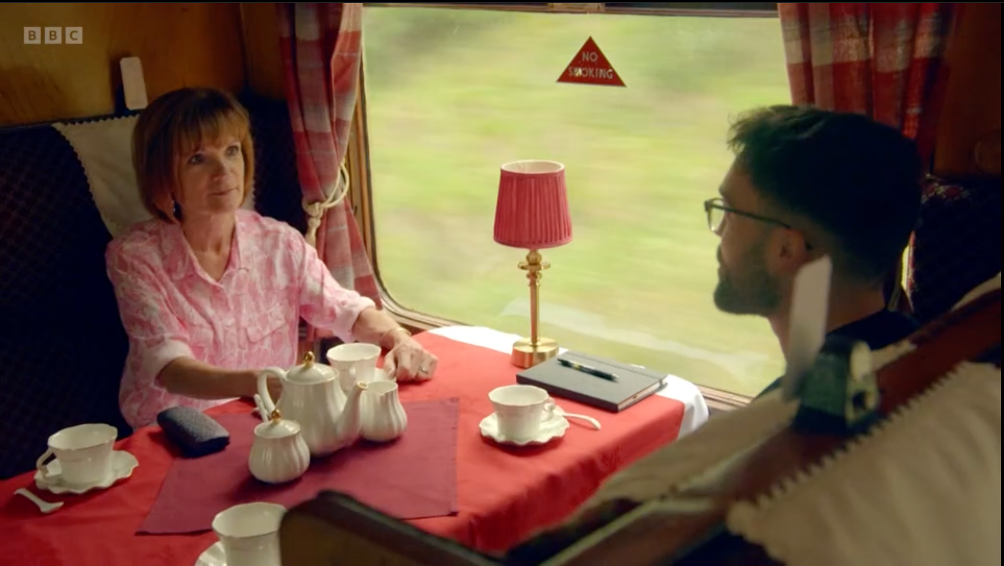 Diane and Ross ride the train together pretending they’ve never met before