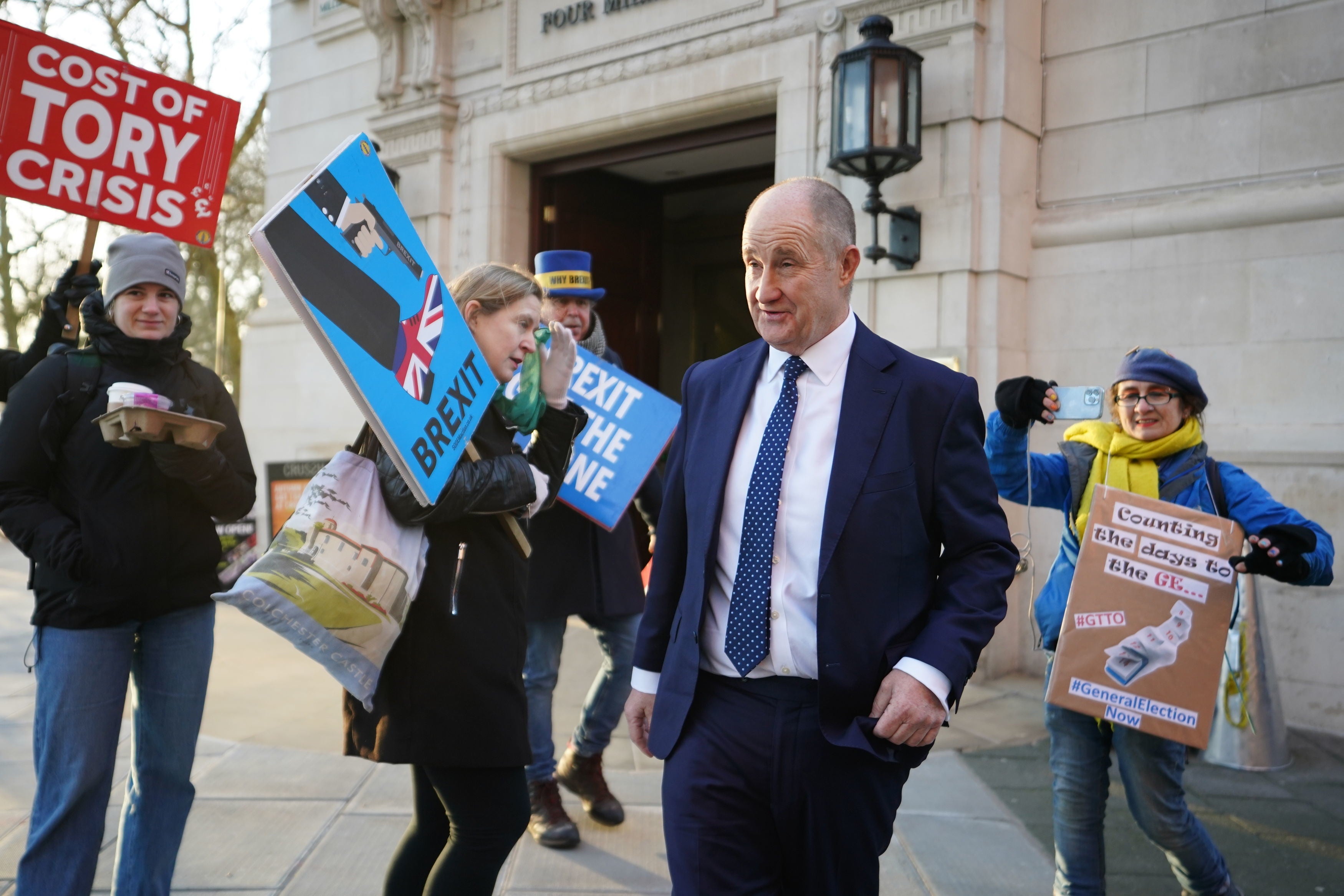 Kevin Hollinrake, surrounded by Brexit protesters