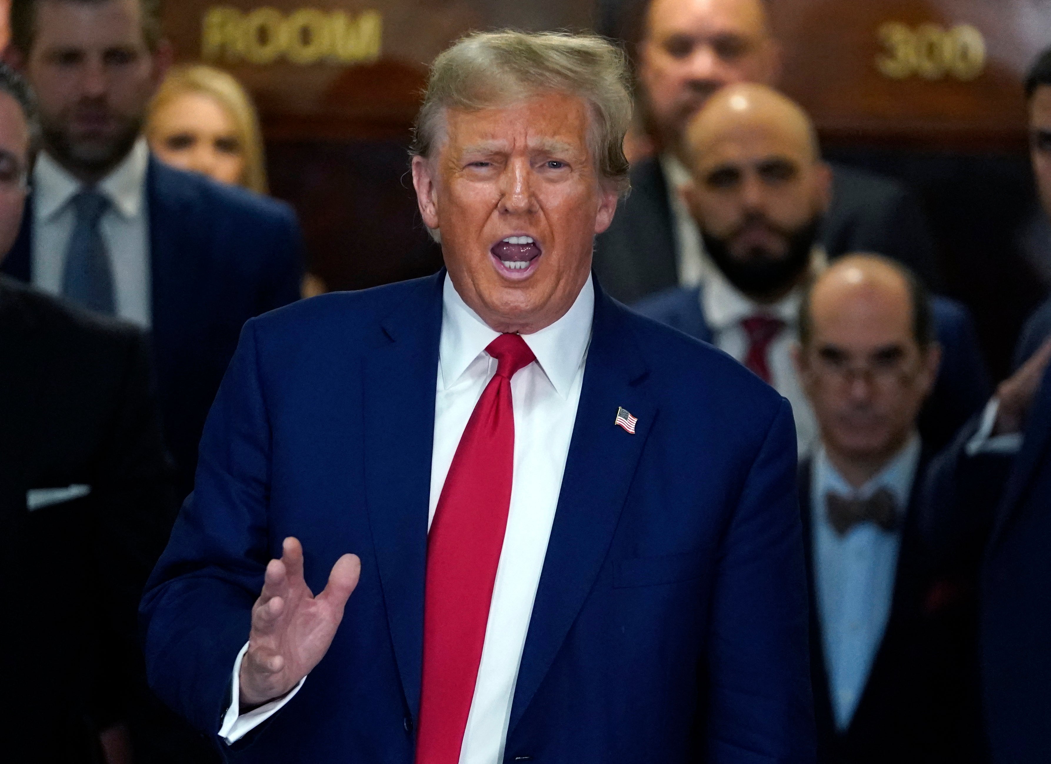 Former US President Donald Trump speaks to the press as he departs the New York State Supreme Court during the civil fraud trial against the Trump Organization, in New York City on January 11, 2024