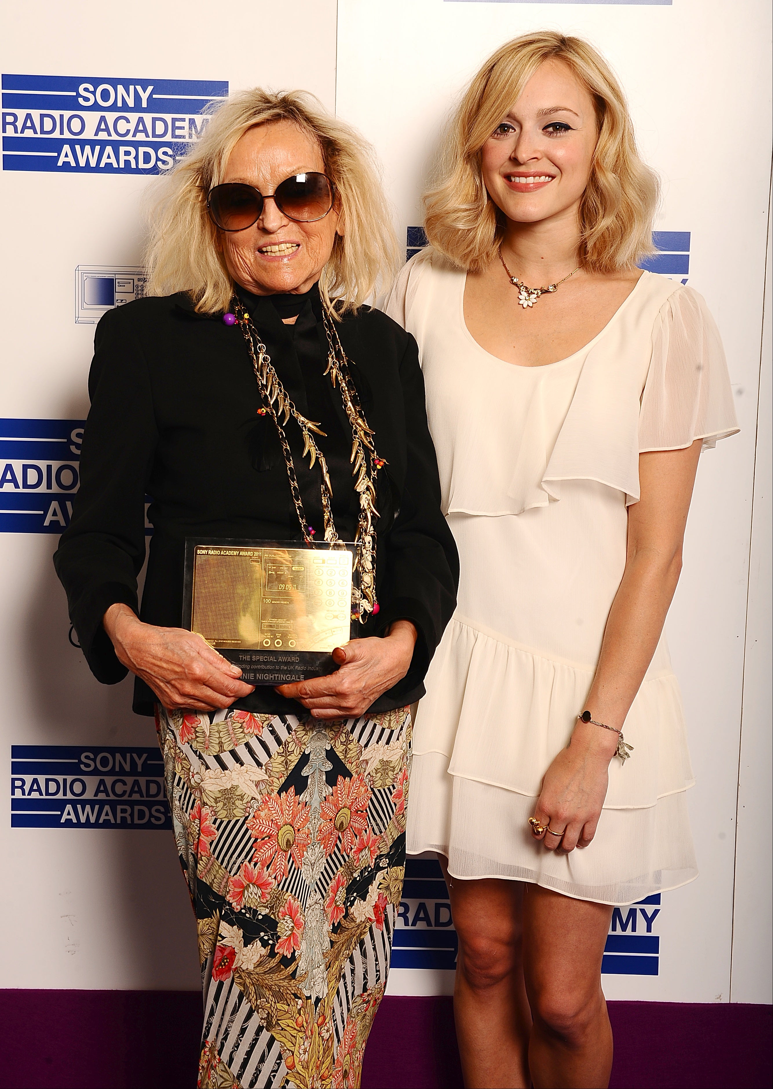 Nightingale and fellow broadcaster Fearne Cotton with the Special Award, at the Sony Radio Academy Awards in 2011