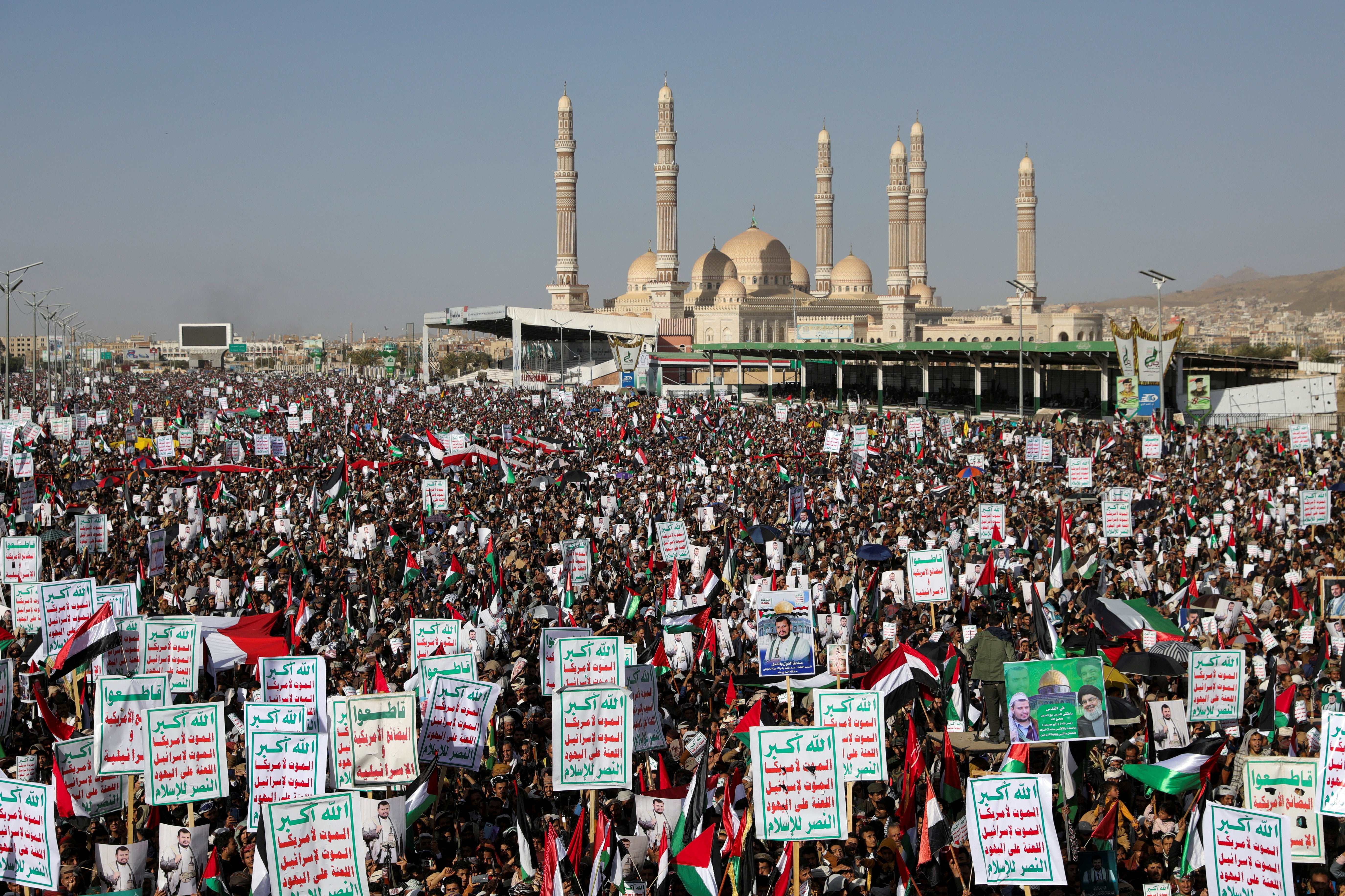 Supporters of the Houthi movement rally to denounce air strikes launched by the US and Britain on Houthi targets, in Sanaa, Yemen 12 January 2024