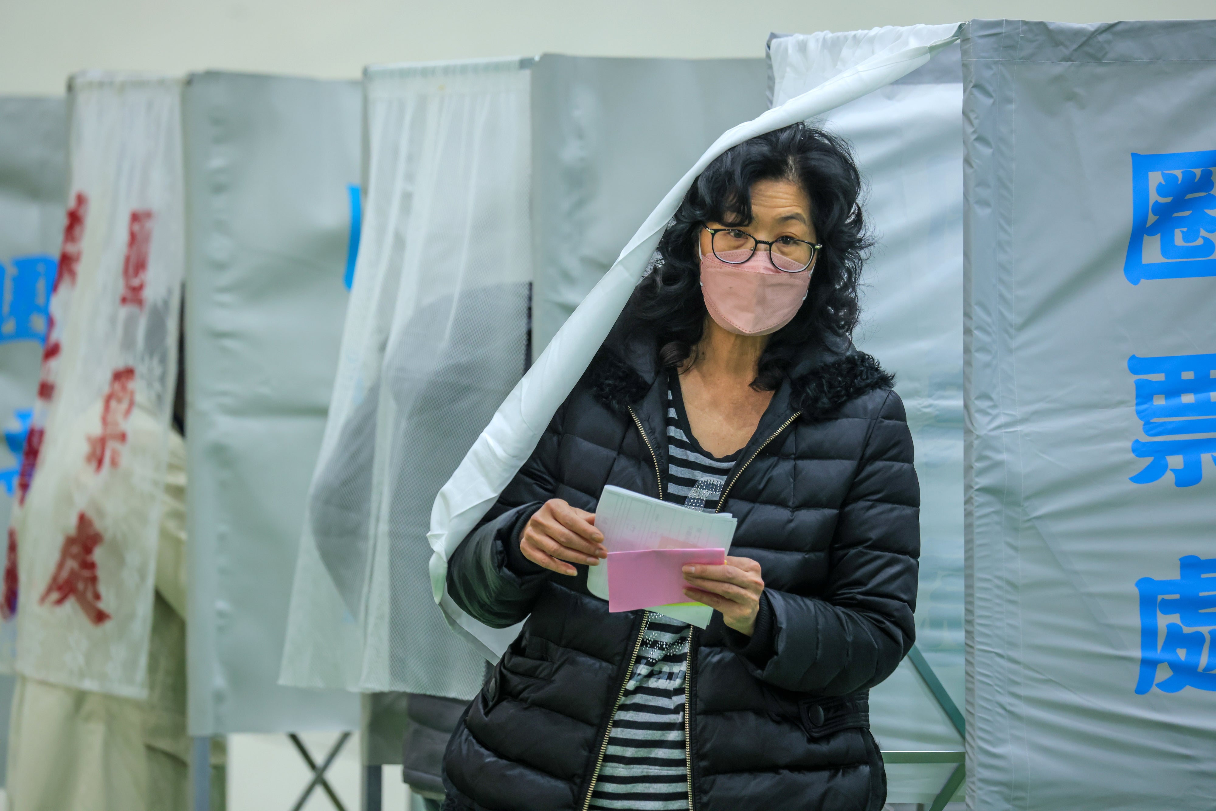 Voters cast their ballots in the presidential election on 13 January 2024 in Tai, Taiwan