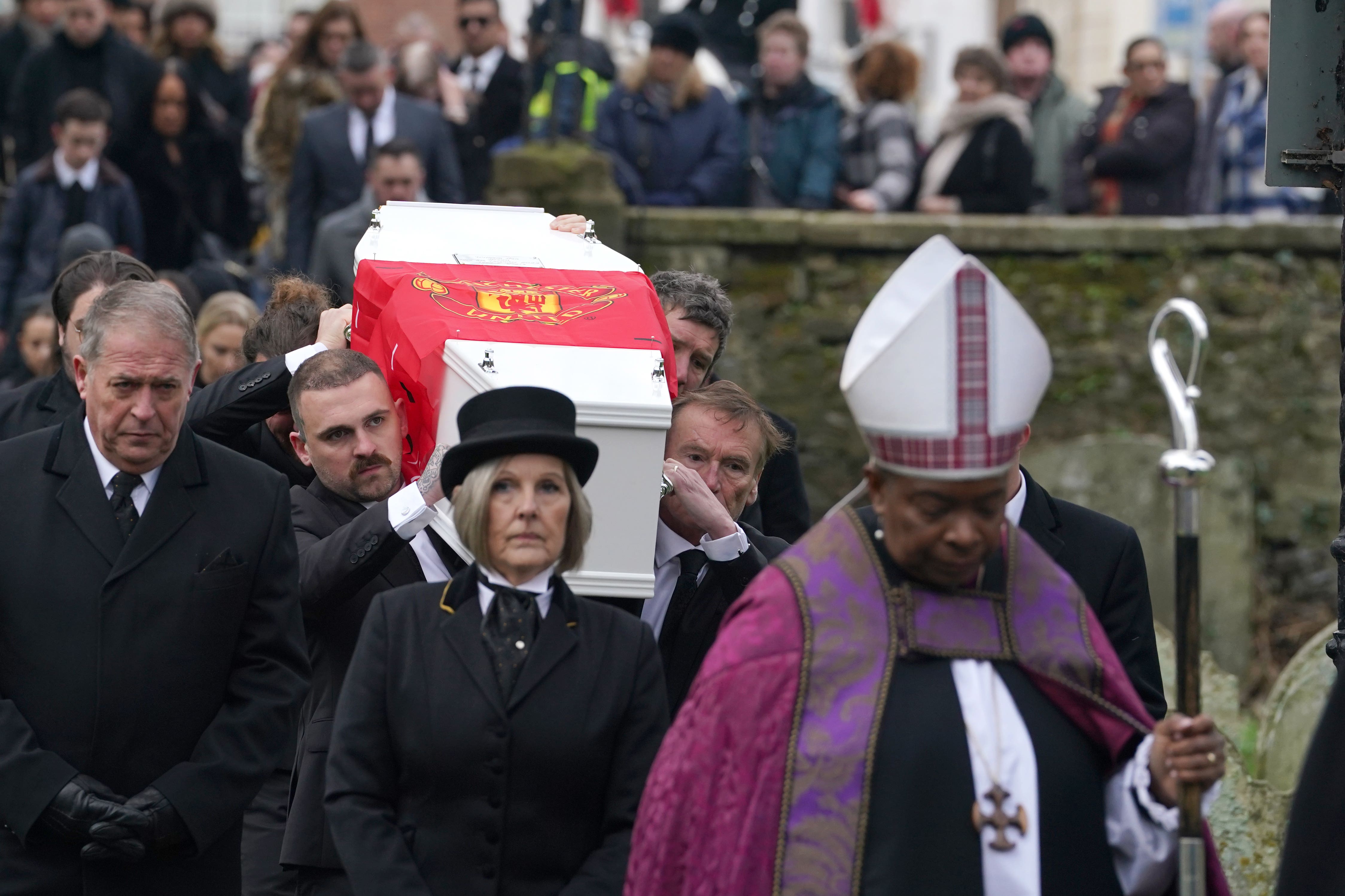 The coffin of William Brown is carried into St Mary And St Eanswythe Church, Folkestone