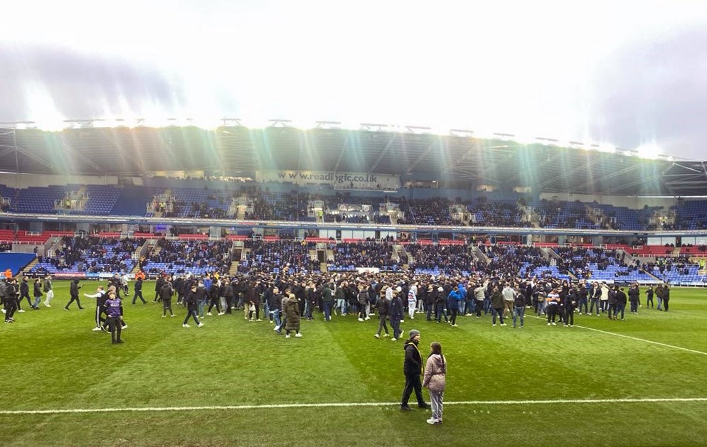 Reading fans flooded the pitch and refused to leave