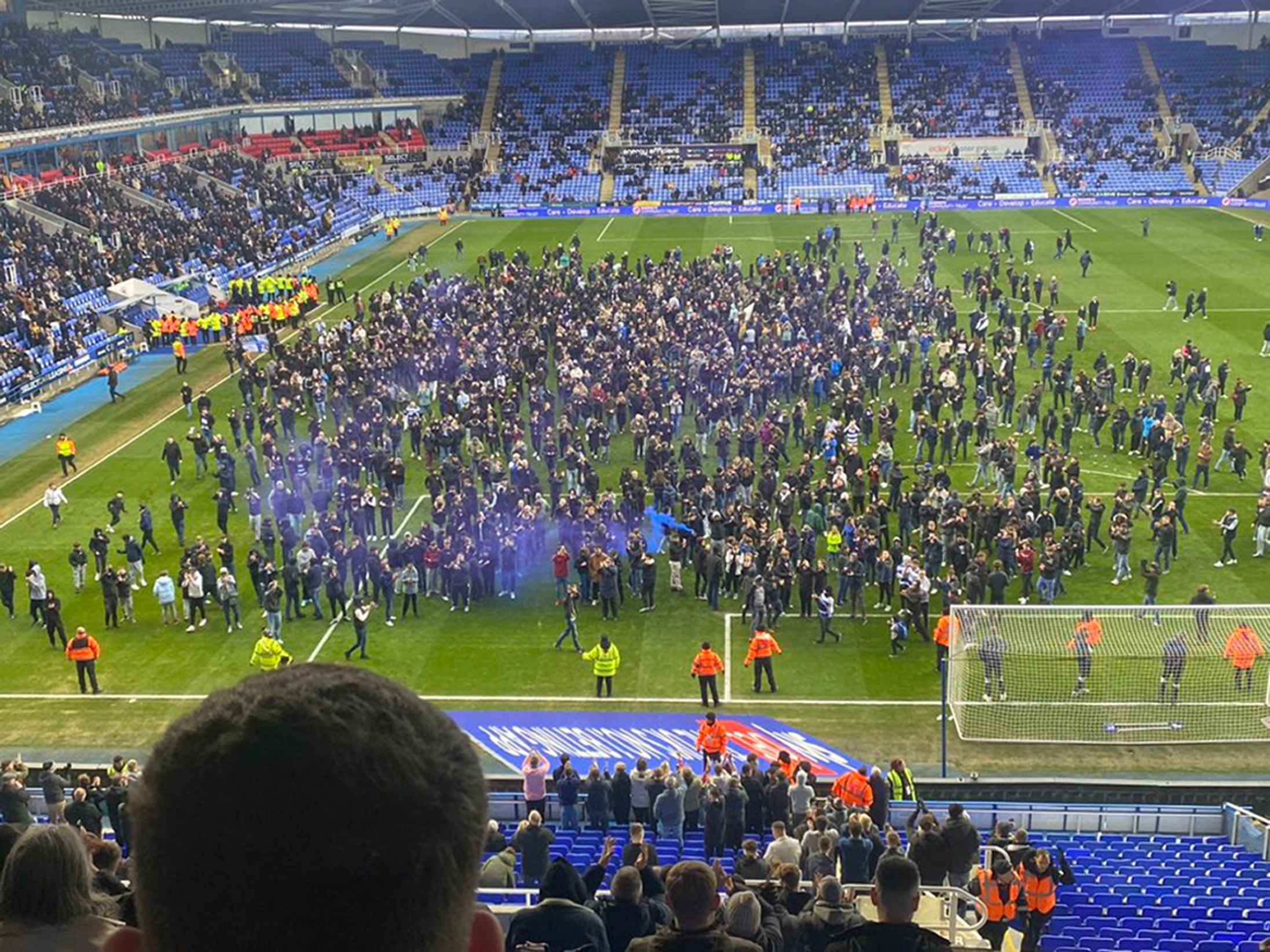 Reading fans have invaded the pitch as part of their ongoing protests against owner Dai Yongge