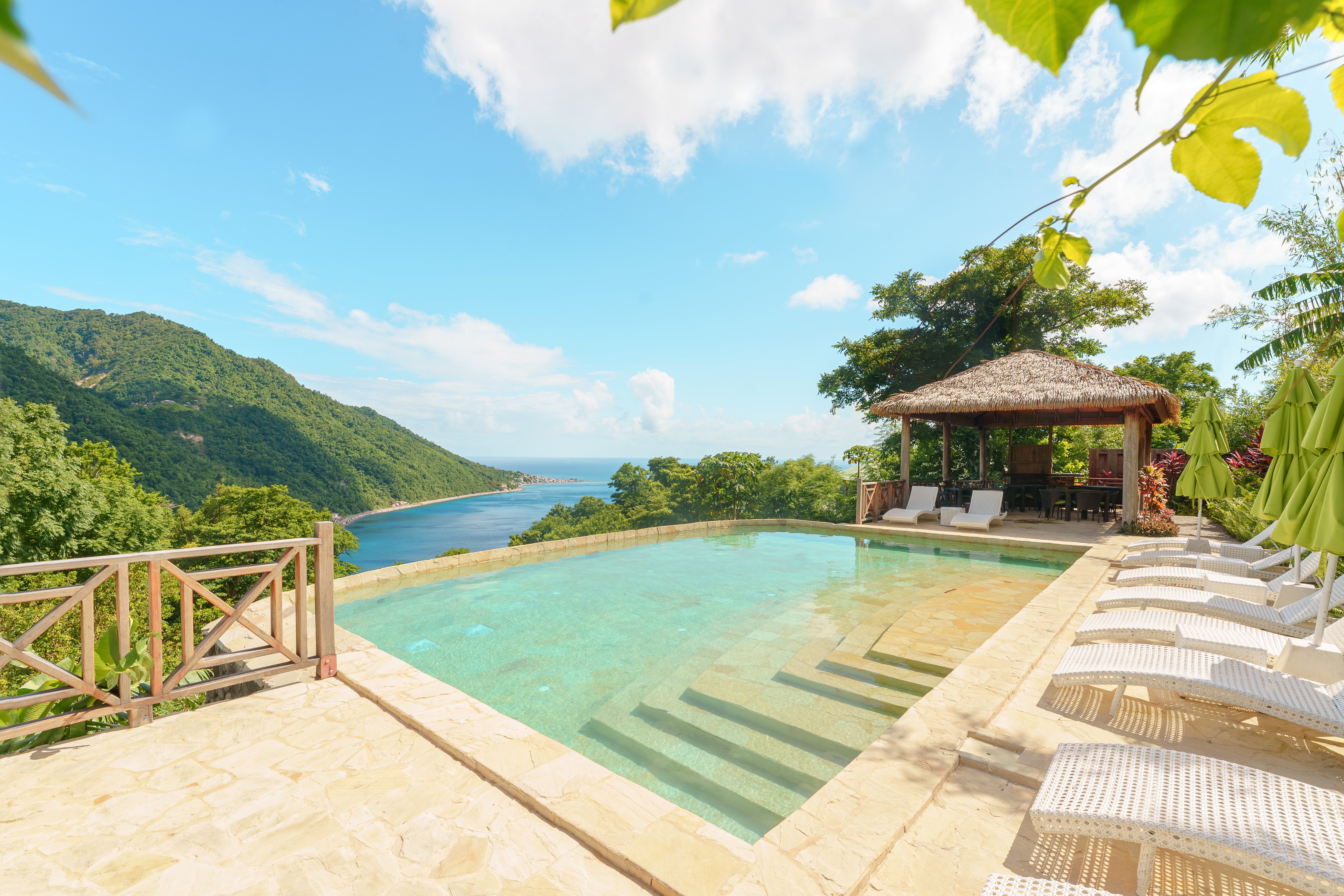 Watch the Caribbean Sea and the Atlantic Ocean meet over the Scotts Head peninsula