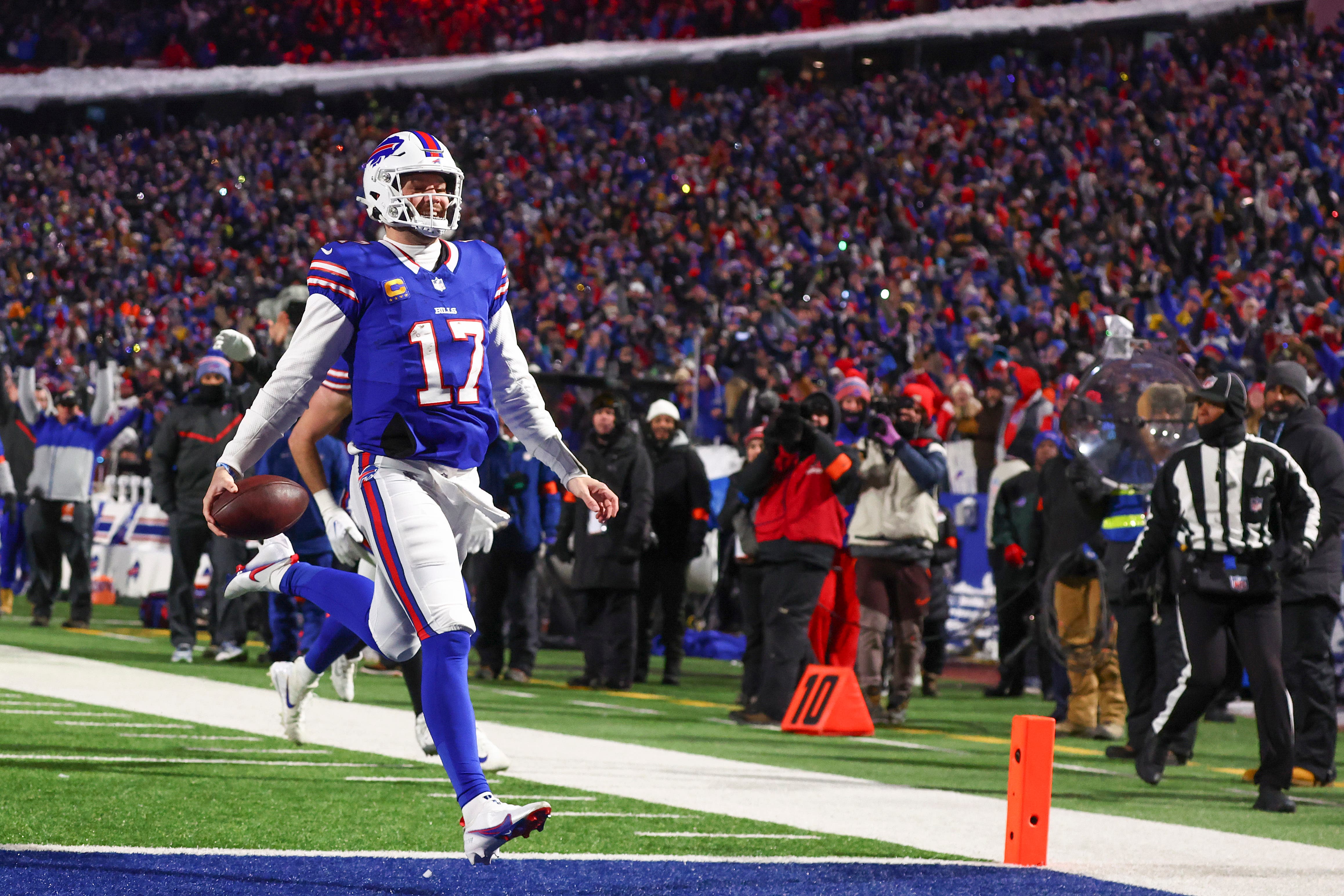 Buffalo Bills quarterback Josh Allen crosses the goal line for a touchdown against the Pittsburgh Steelers (Jeffrey T Barnes/AP)