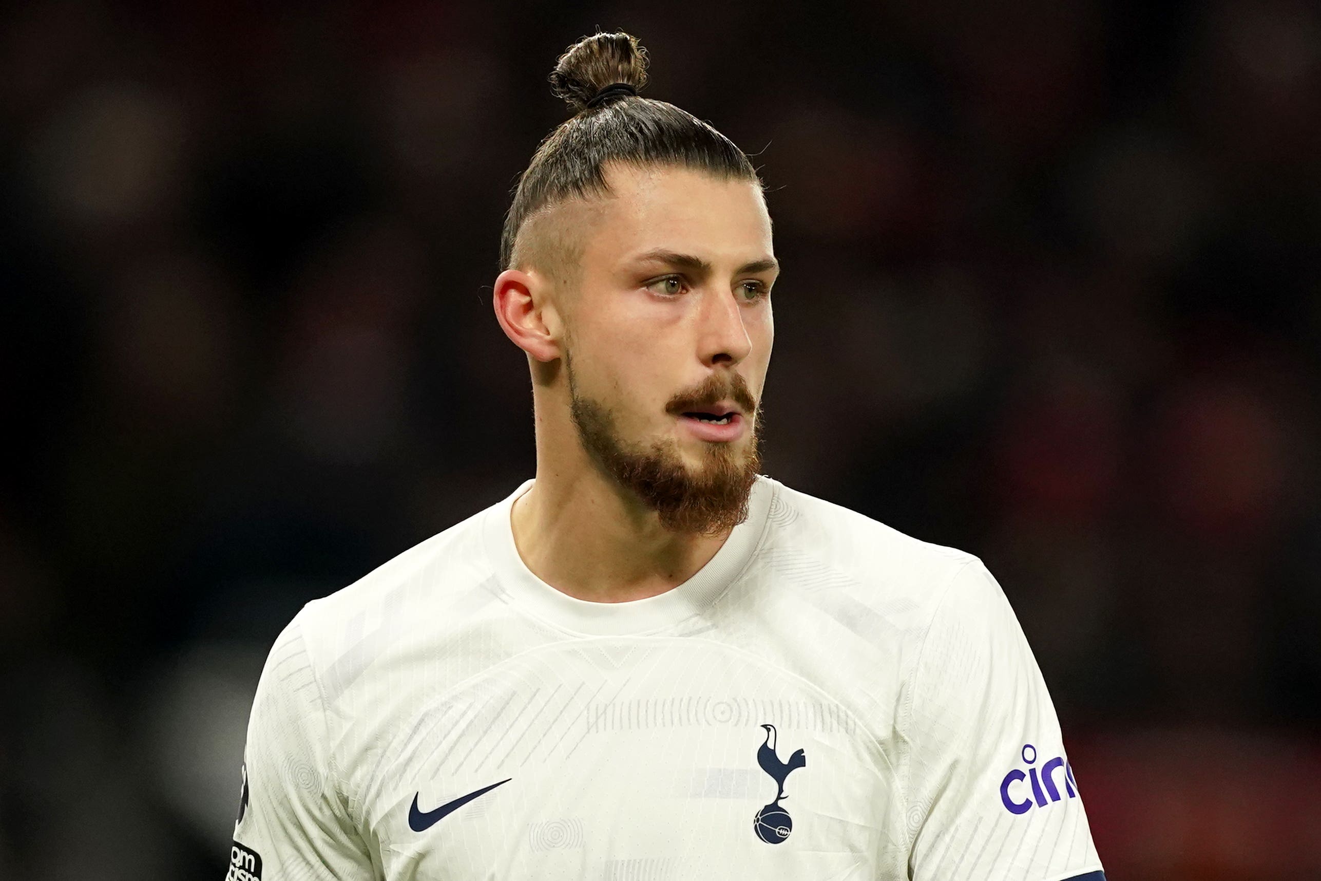 Radu Dragusin made his Tottenham debut at Manchester United (Martin Rickett/PA)