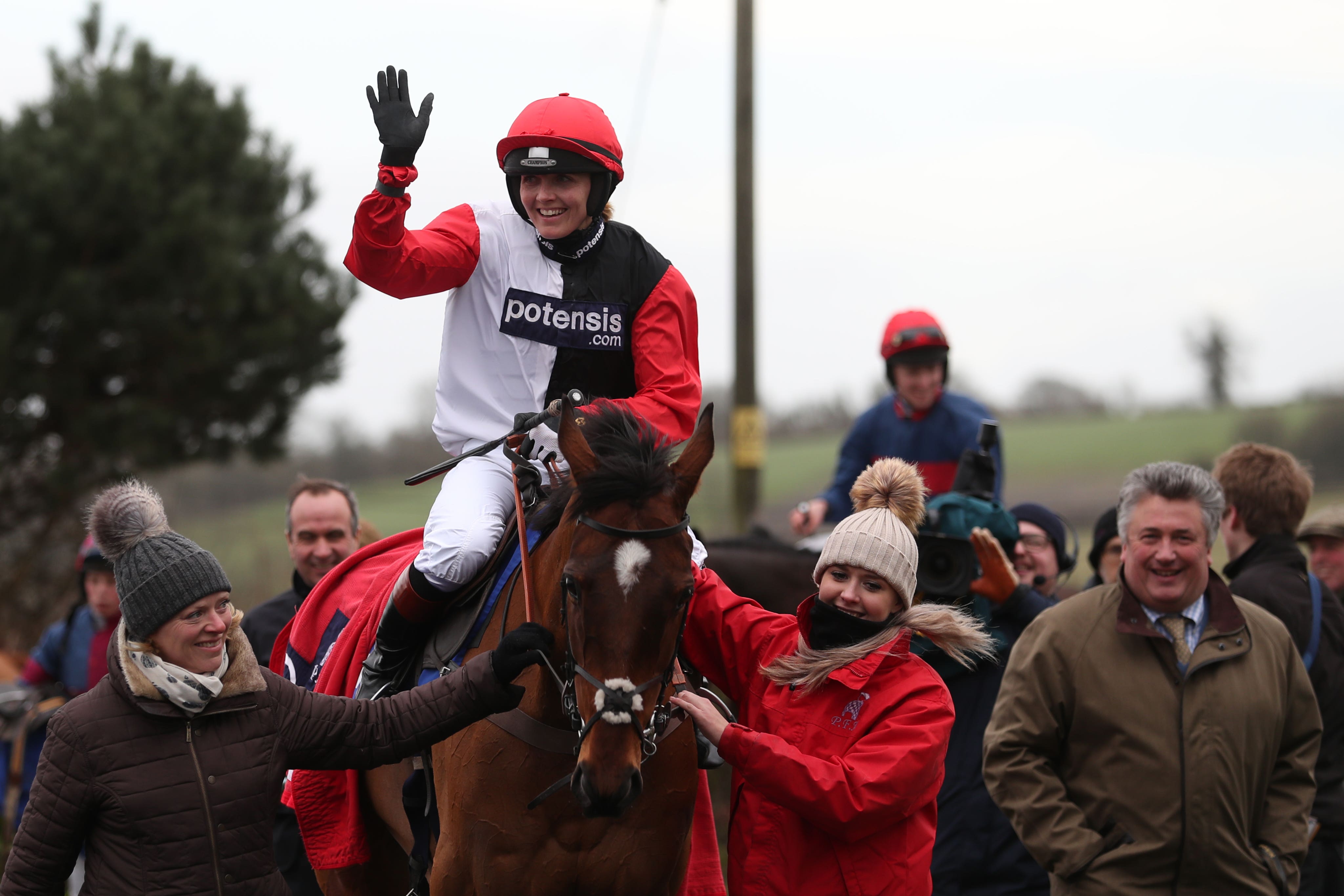 Victoria Pendleton on Pacha Du Polder celebrates winning the Betfair Switching Saddles Hunter Chase at Wincanton Racecourse, Somerset.