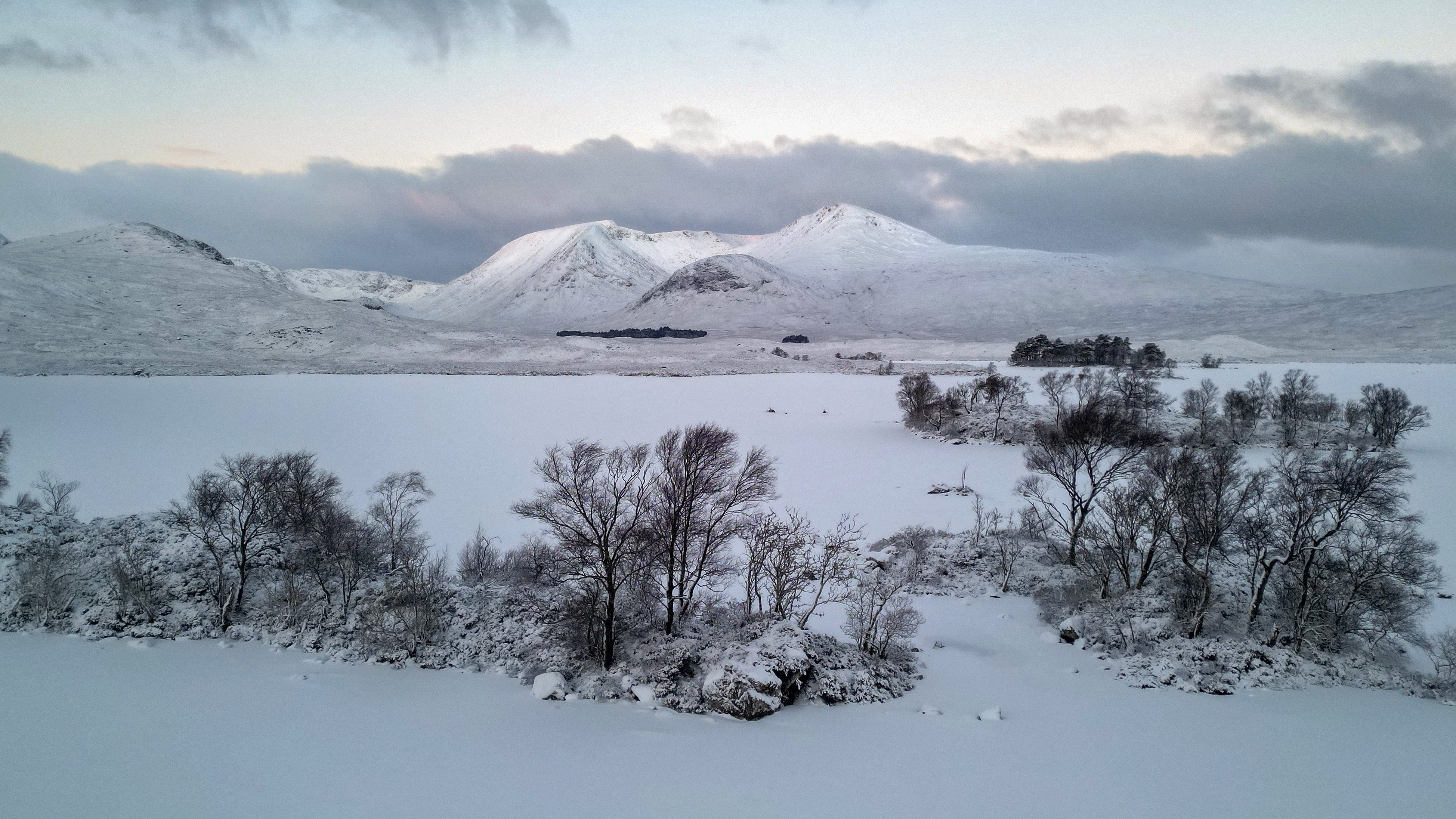 Freezing temperatures continue this week as snow blankets parts of the UK