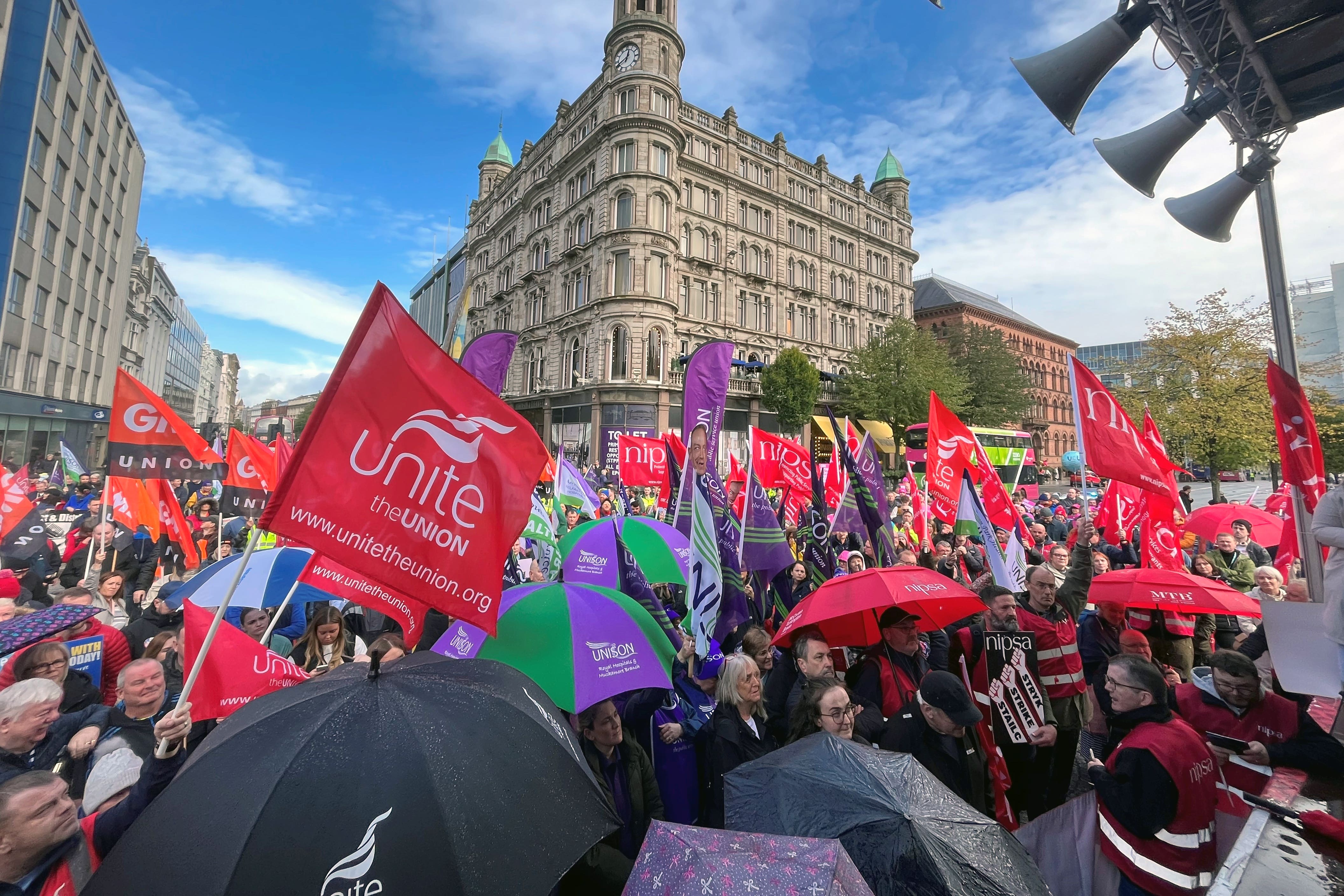 Union members gathered at Belfast City Hall during a previous strike by healthcare workers (Claudia Savage/PA)