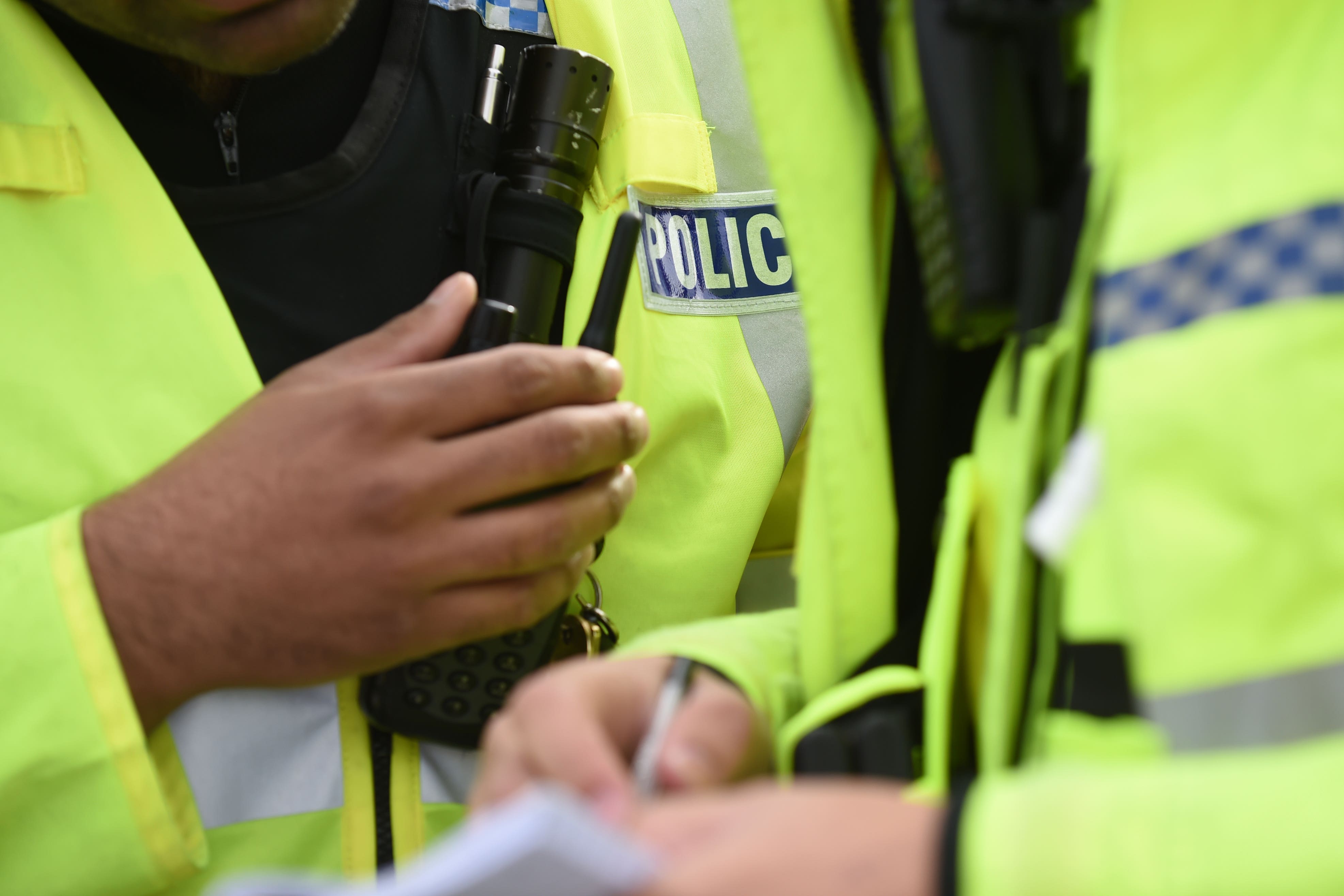 Detail of Police officers (Joe Giddens/PA)