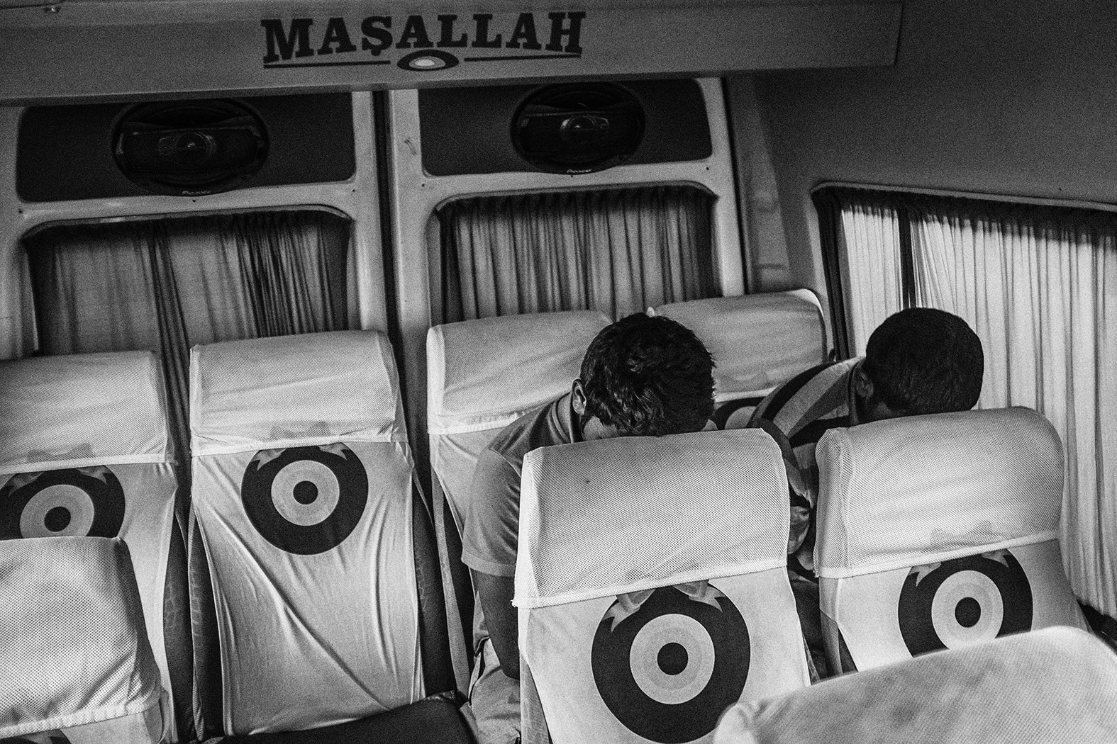 Exhausted refugees who failed to cross the sea from the Turkish coast to the Greek island of Kos head back to Bodrum city centre by bus before trying to cross again later in July 2015