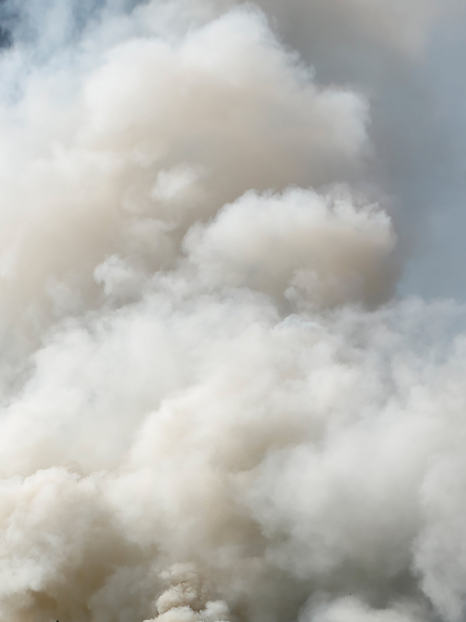 Smoke and tear gas fill the sky as Turkish police and protesters clash near Taksim Square in Istanbul on the first day of the Gezi park protests in June 2013