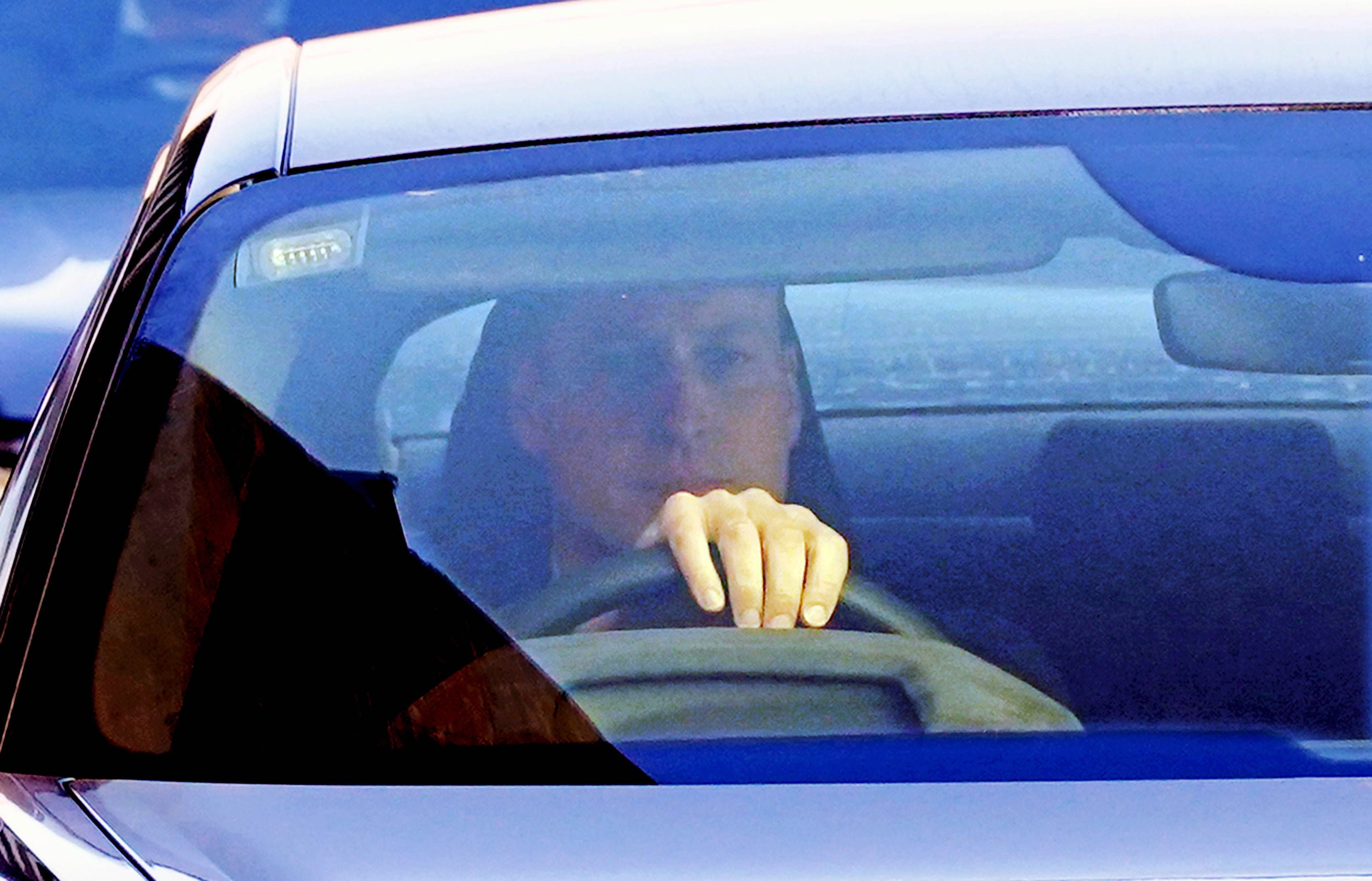 The Prince of Wales drives away from the London Clinic, in central London, where the Princess of Wales was recovering