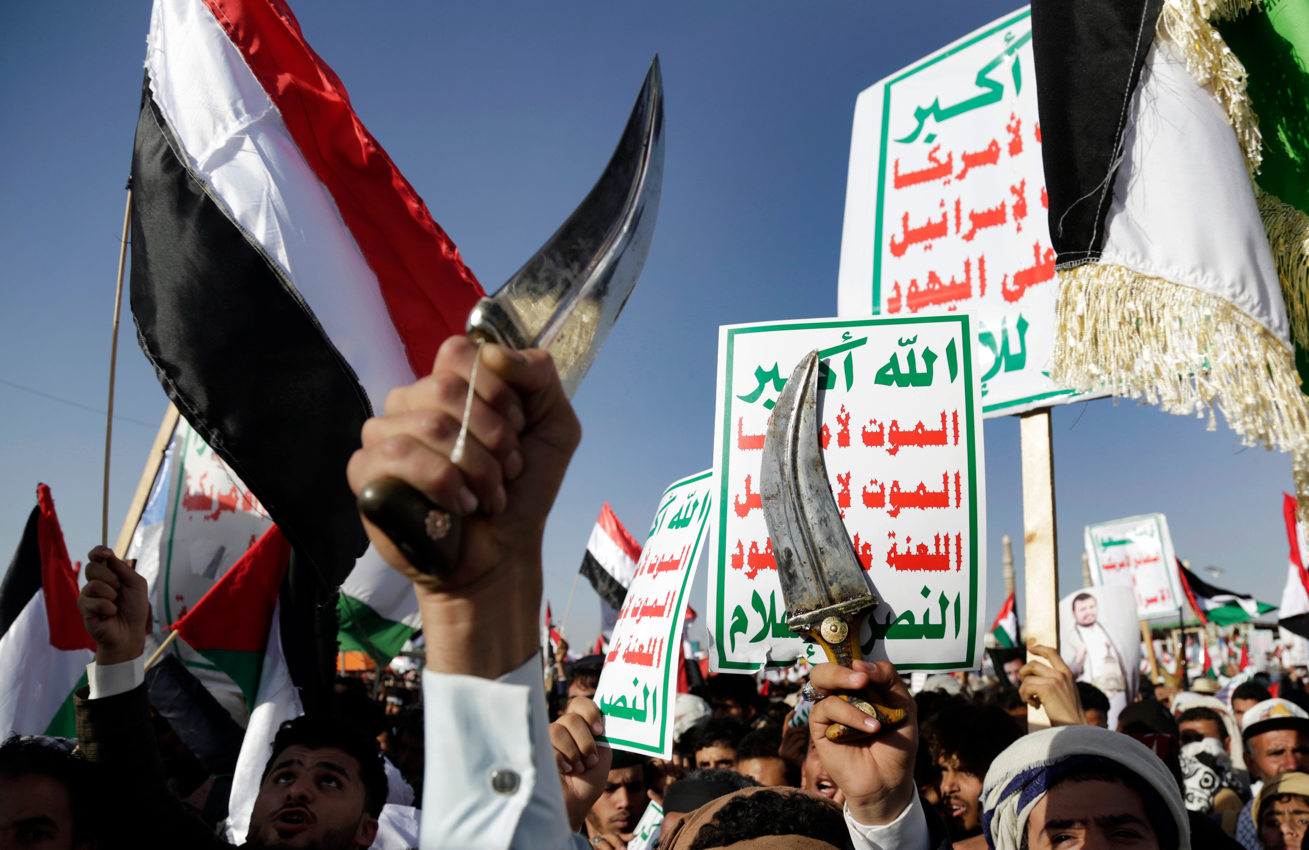 Houthi supporters attend a protest in Sanaa, Yemen, against the US-led airstrikes