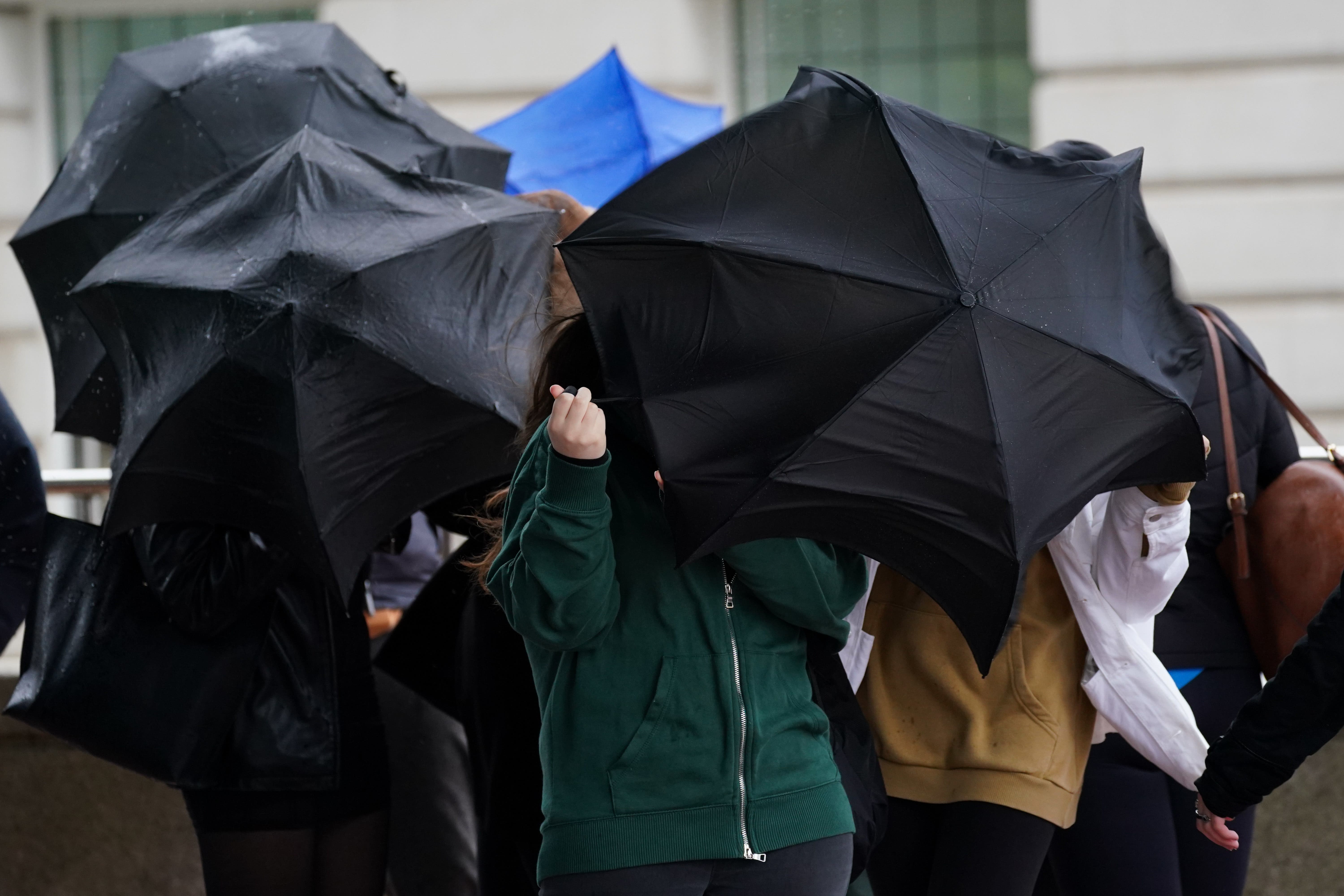 The amber wind warnings also mean potential power cuts and loss of mobile phone signal in affected areas (Jacob King/PA)