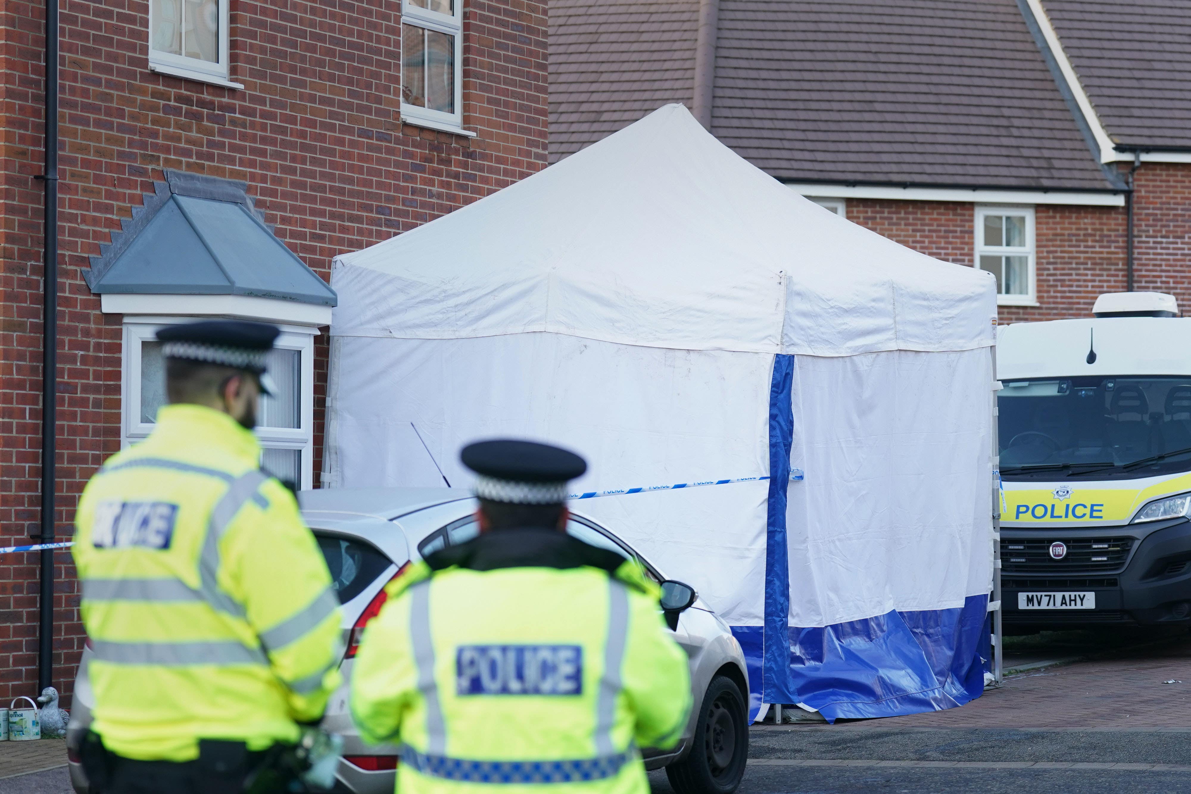 Police outside a house in Costessey near Norwich after four people were found dead inside the property (Joe Giddens/ PA)