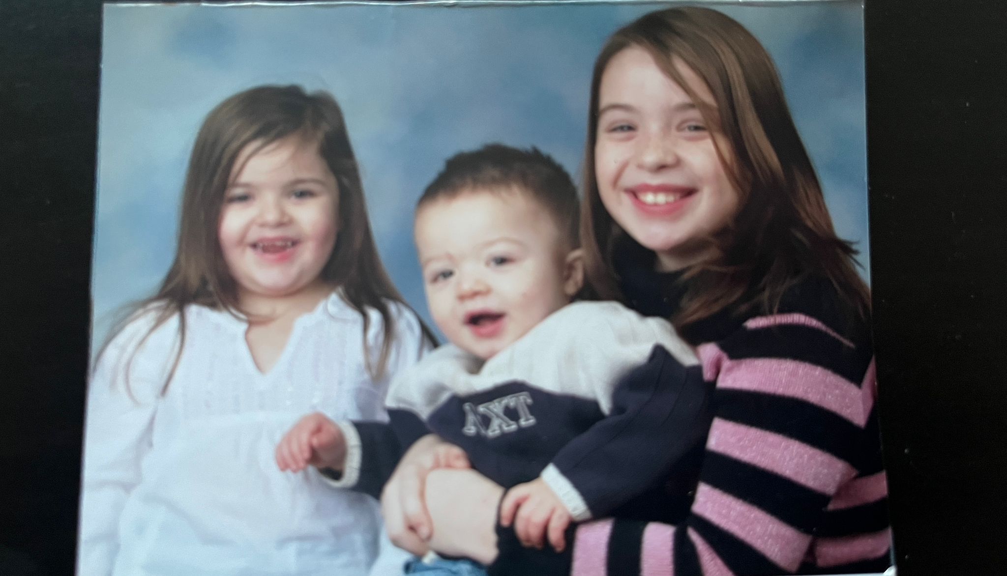 Morgan as a young girl pictured with her siblings