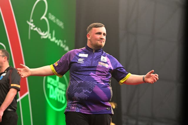 <p>Luke Littler celebrates at the Bahrain Darts Masters</p>