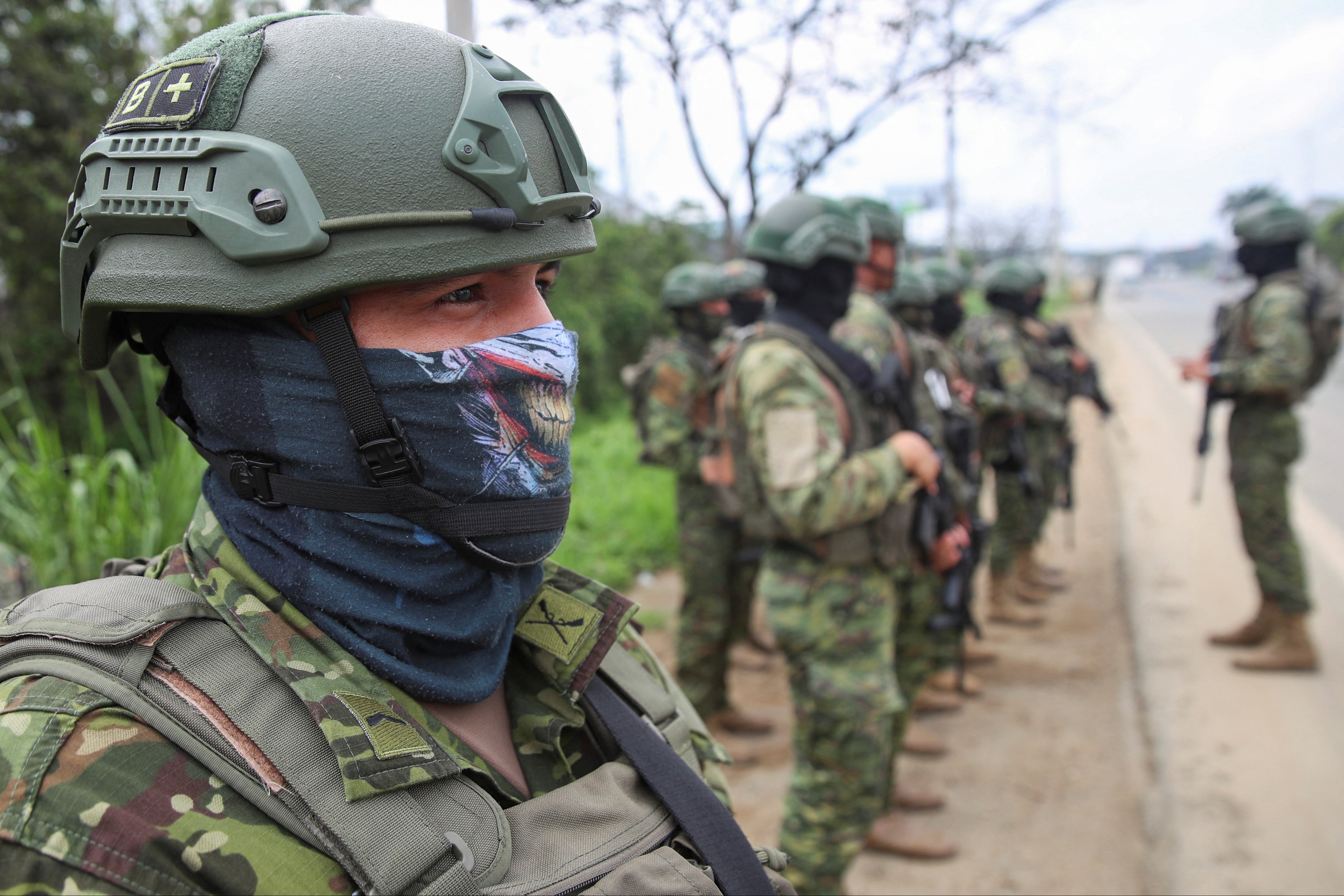 Soldiers stand near a checkpoint in Guayaquil, amid the ongoing wave of danger around the nation