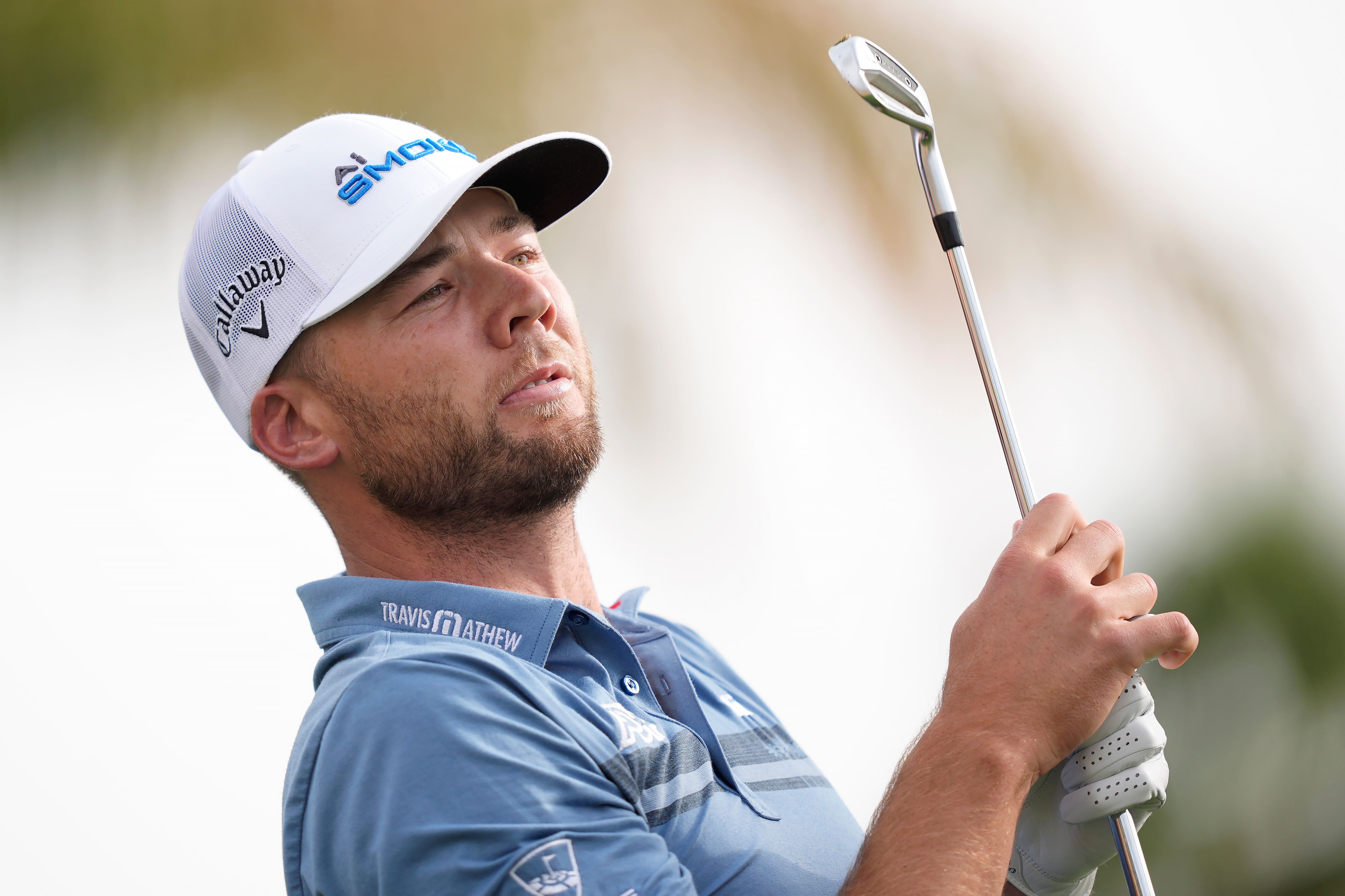Sam Burns watches his shot from the 17th tee at the Nicklaus Tournament Course at PGA West during the second round of the American Express tournament (Ryan Sun/AP)