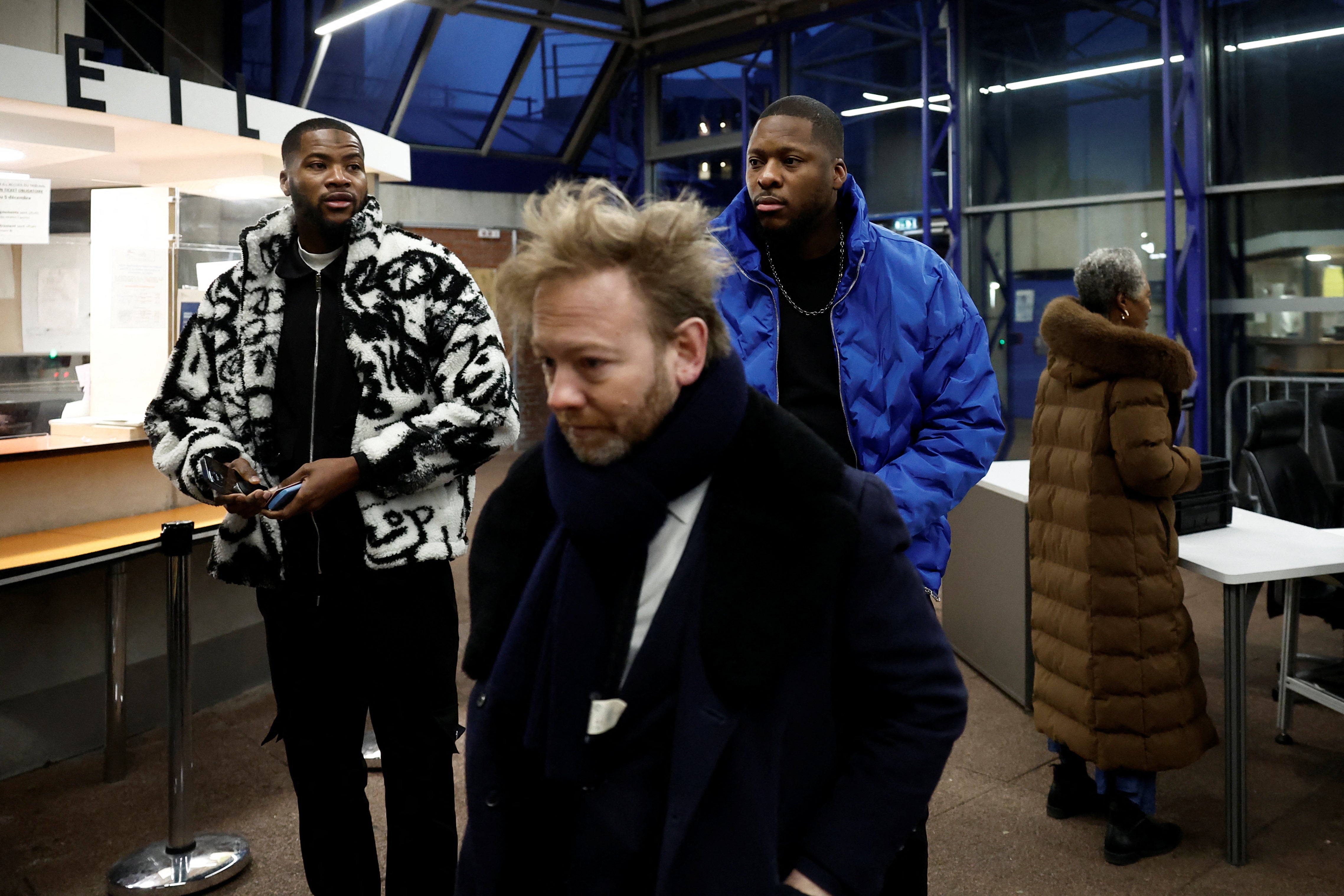 Theodore Luhaka (known as "Theo") arrives with his brother and his lawyer Antoine Vey