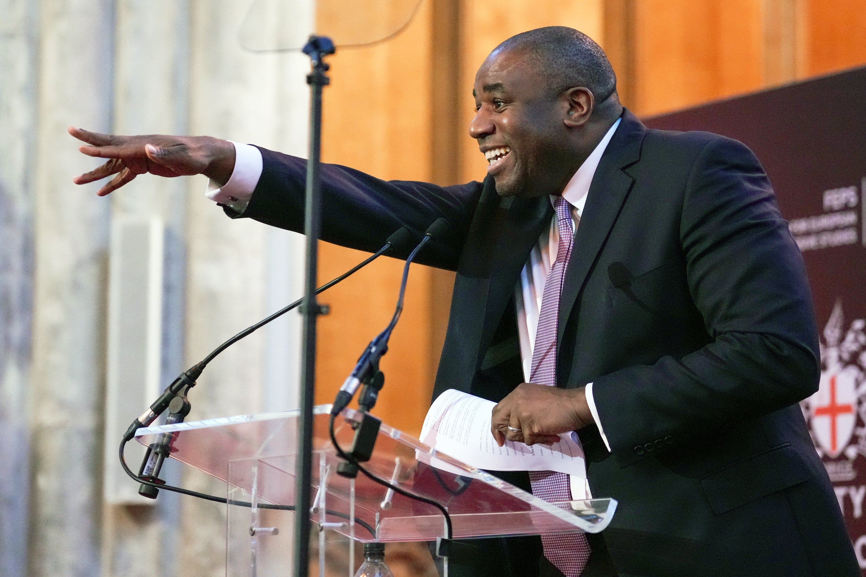 David Lammy continues with his speech after he was interrupted by protesters