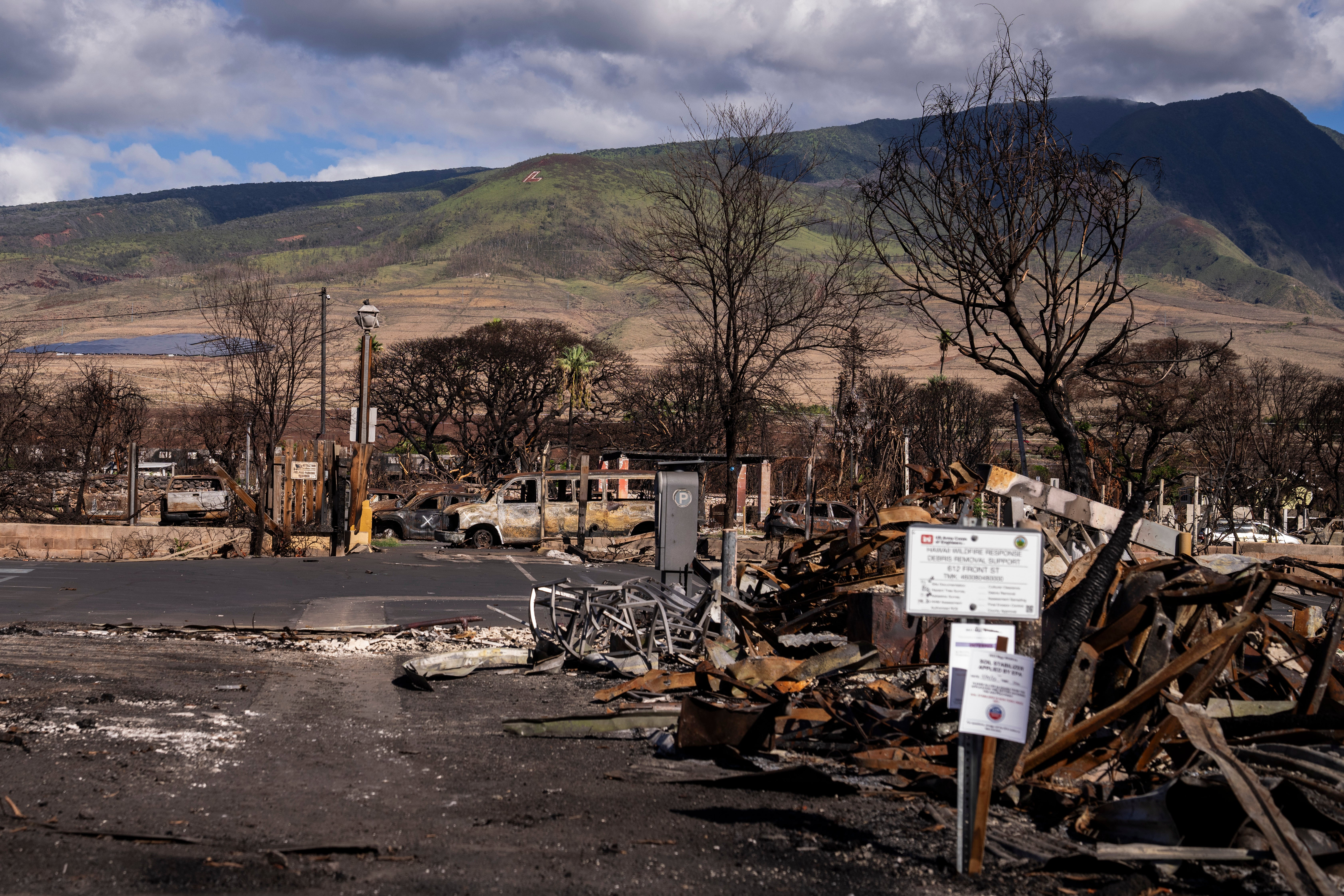 Debris of former shops and businesses on Front Street in burn zone 11A is pictured on 8 December 2023 in Lahaina, Hawaii