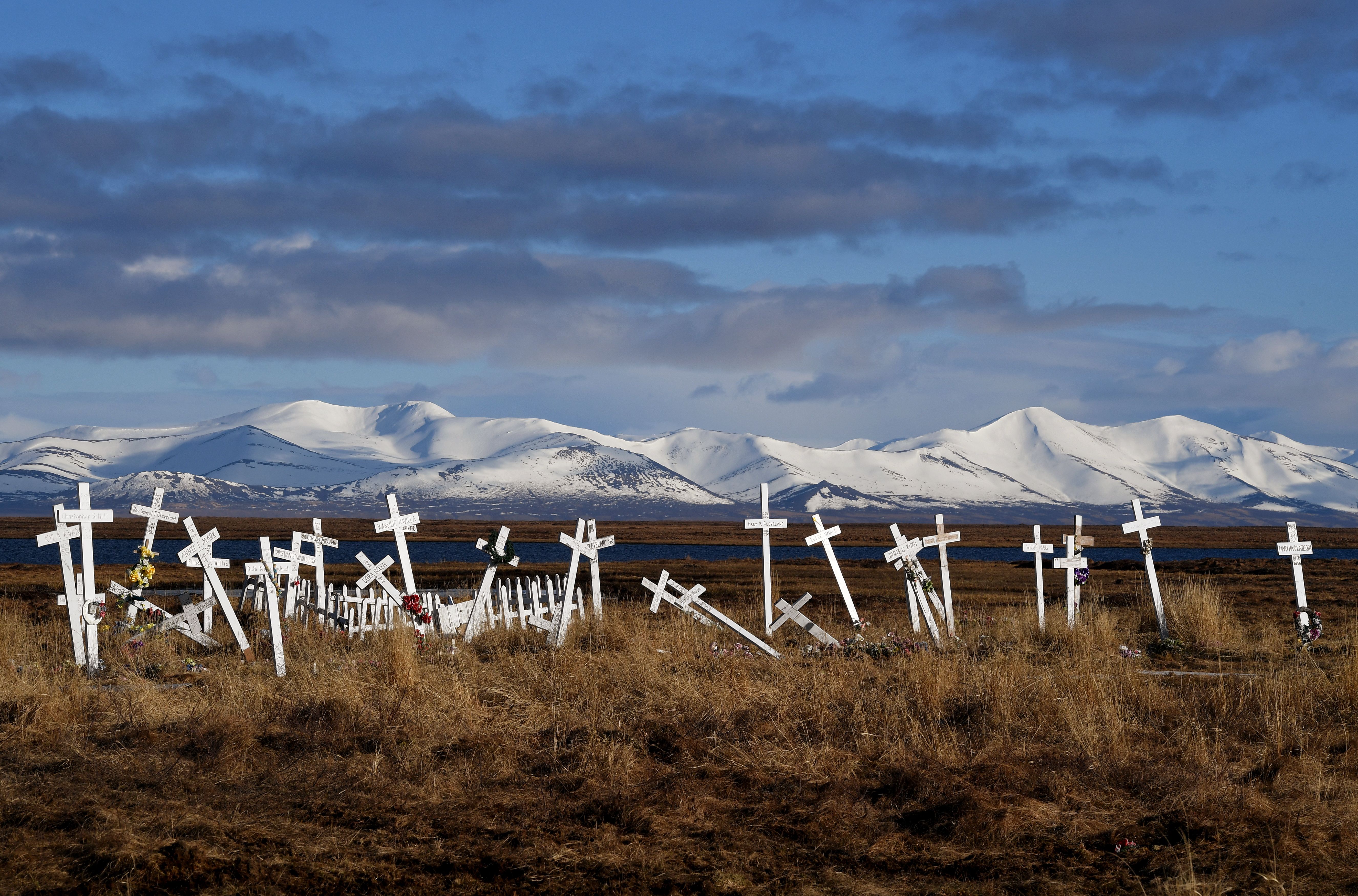 A cemetery sits on melting permafrost tundra at the Yupik Eskimo village of Quinhagak in Alaska