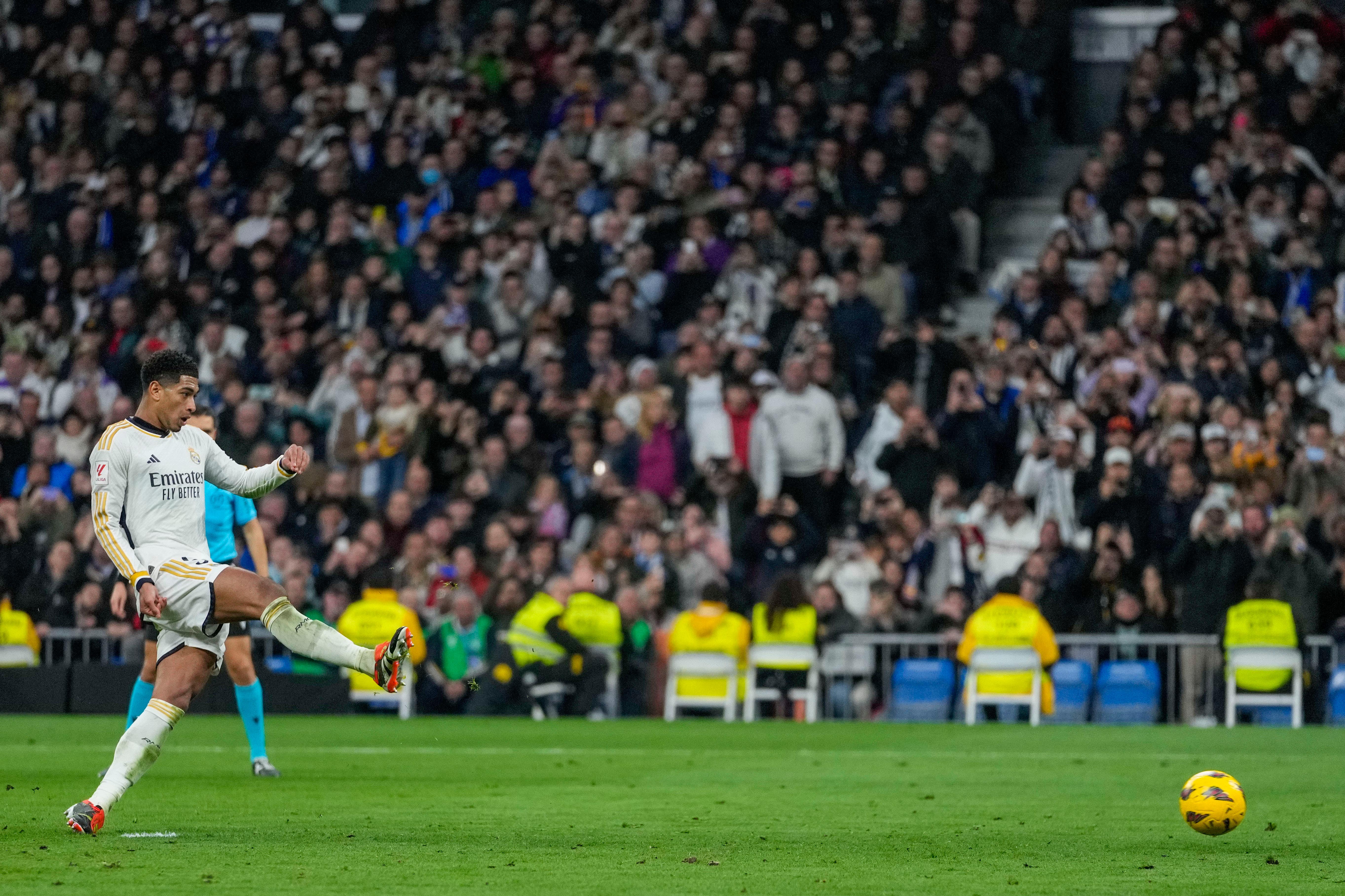 Jude Bellingham scored a penalty in Real Madrid’s dramatic victory over Almeria (Bernat Armangue/AP)