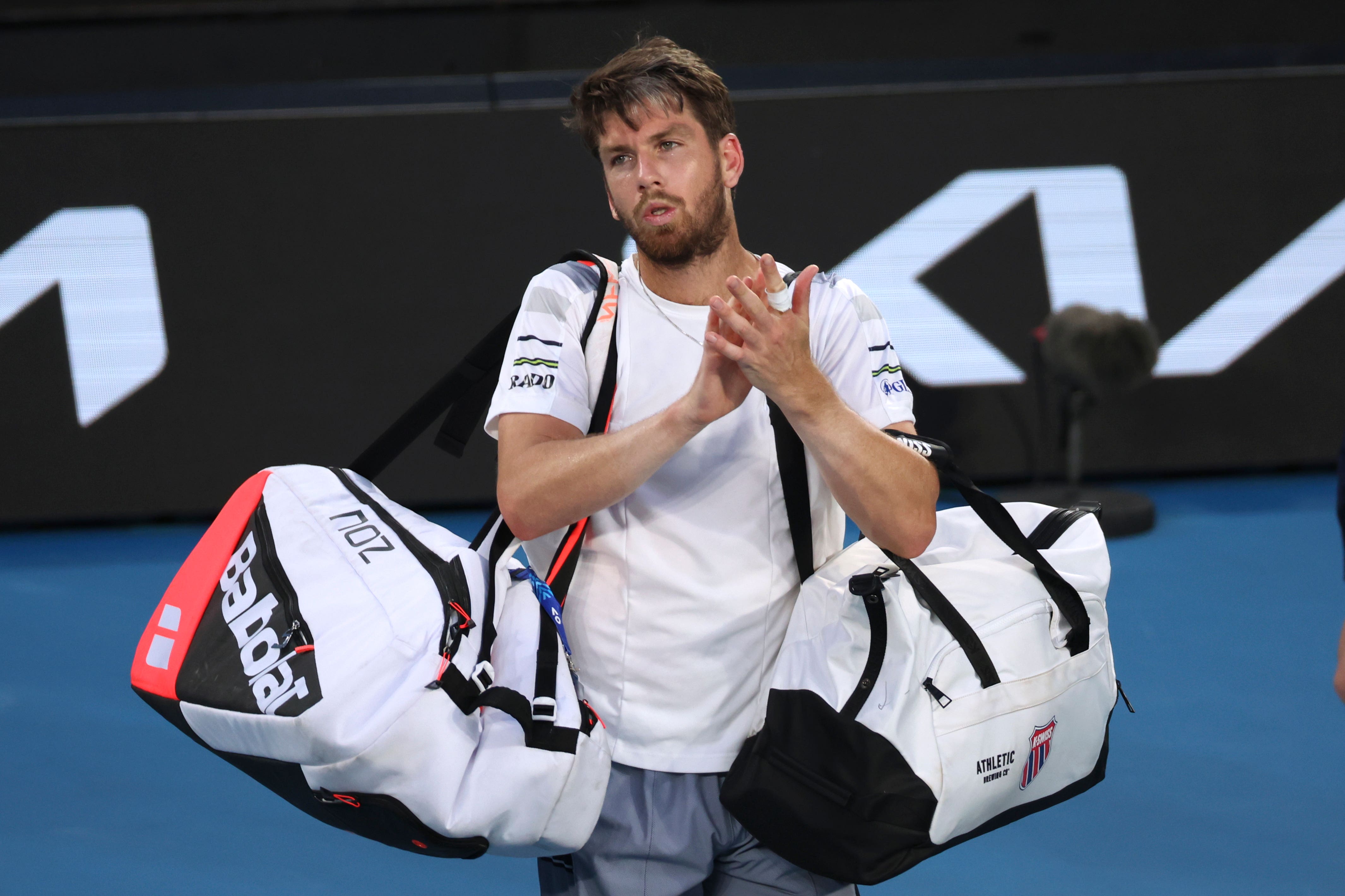 Cameron Norrie applauds the crowd as he leaves the court (Asanka Brendon Ratnayake/AP)