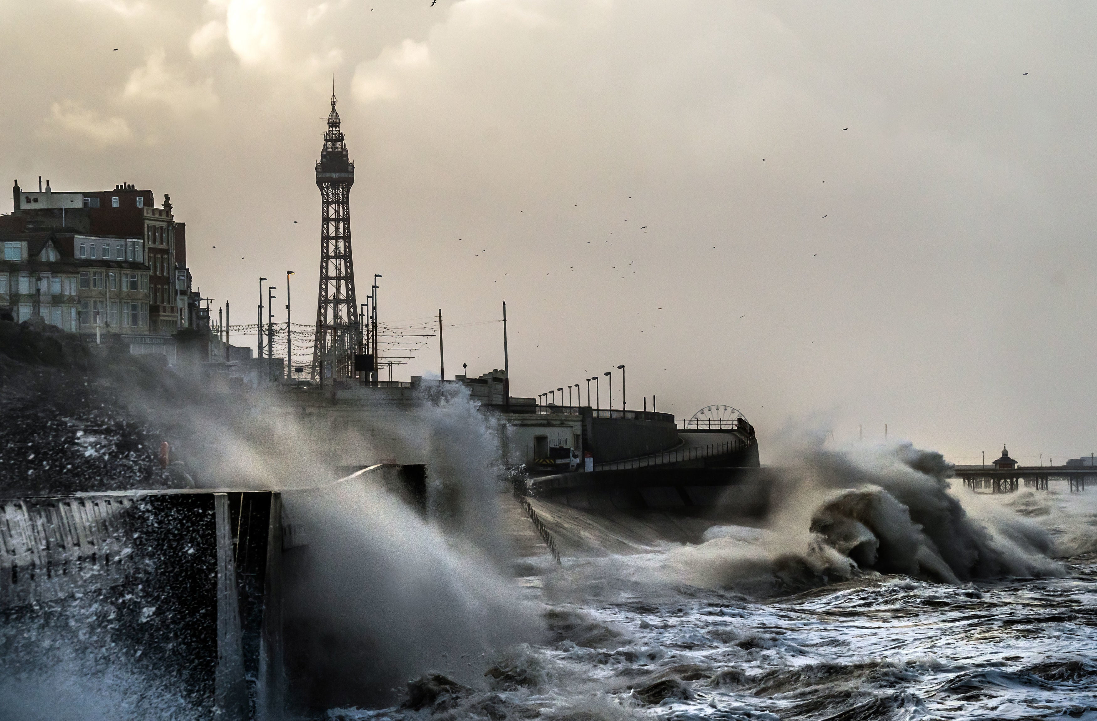 Waves break on the sea front in Blackpool.