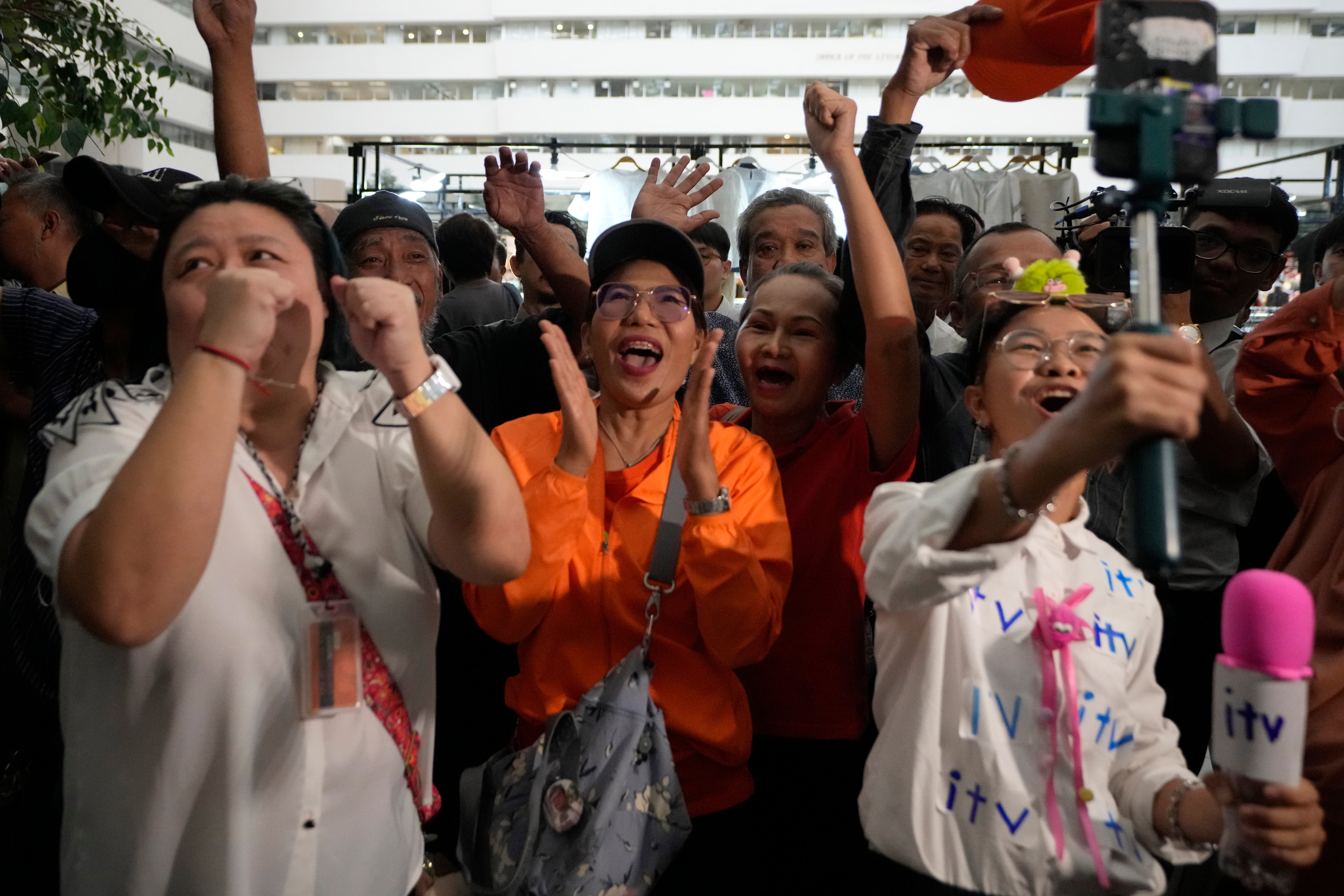 Supporters of Pita Limjaroenrat celebrate at Constitutional Court in in Bangkok, Thailand