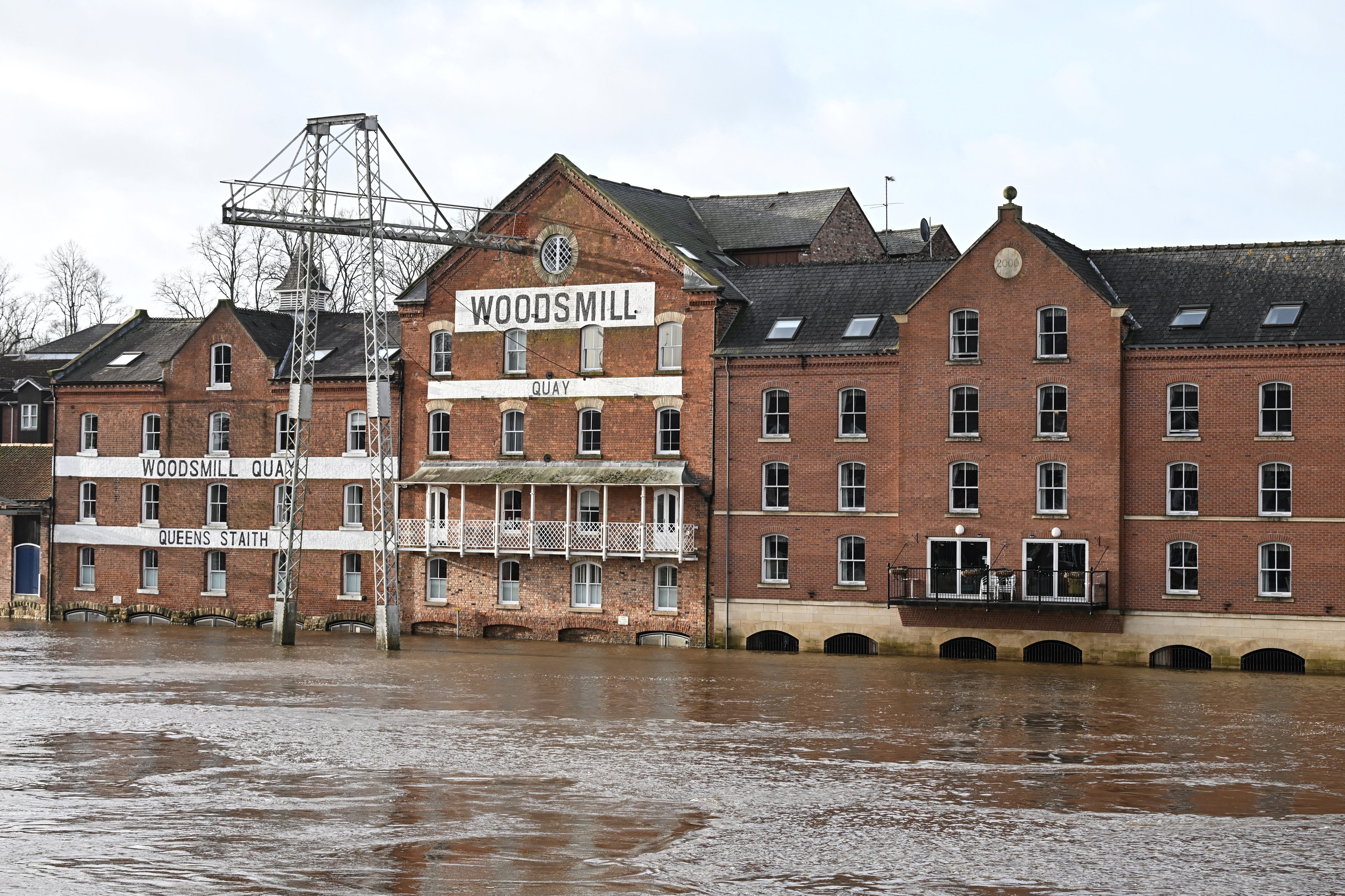 A photograph taken on January 24, 2024, shows a street flooded by the River Ouse after it burst its banks, in central York, following Storm Jocelyn