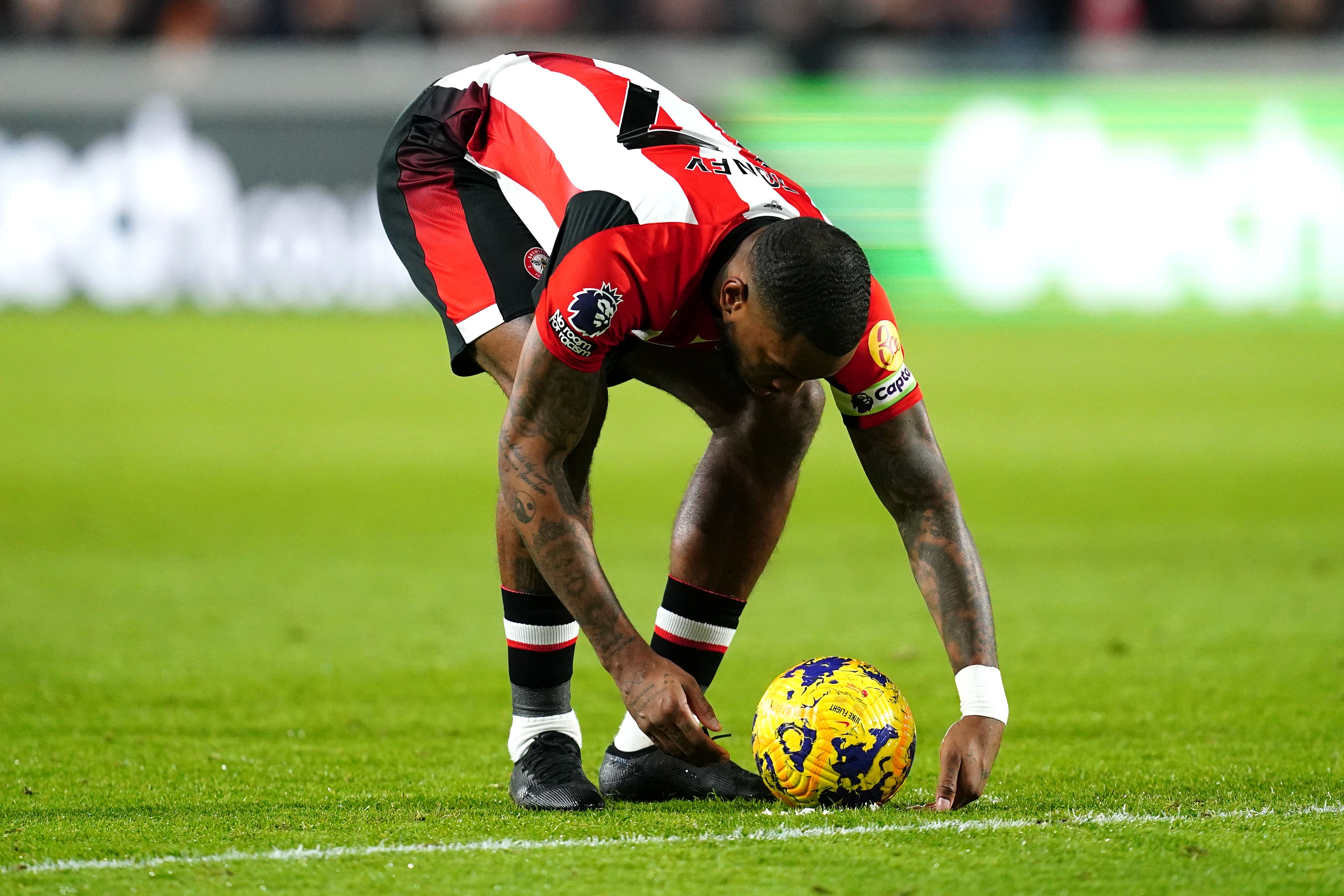 Ivan Toney moves the vanishing spray and ball before scoring his free-kick against Forest (Nick Potts/PA)