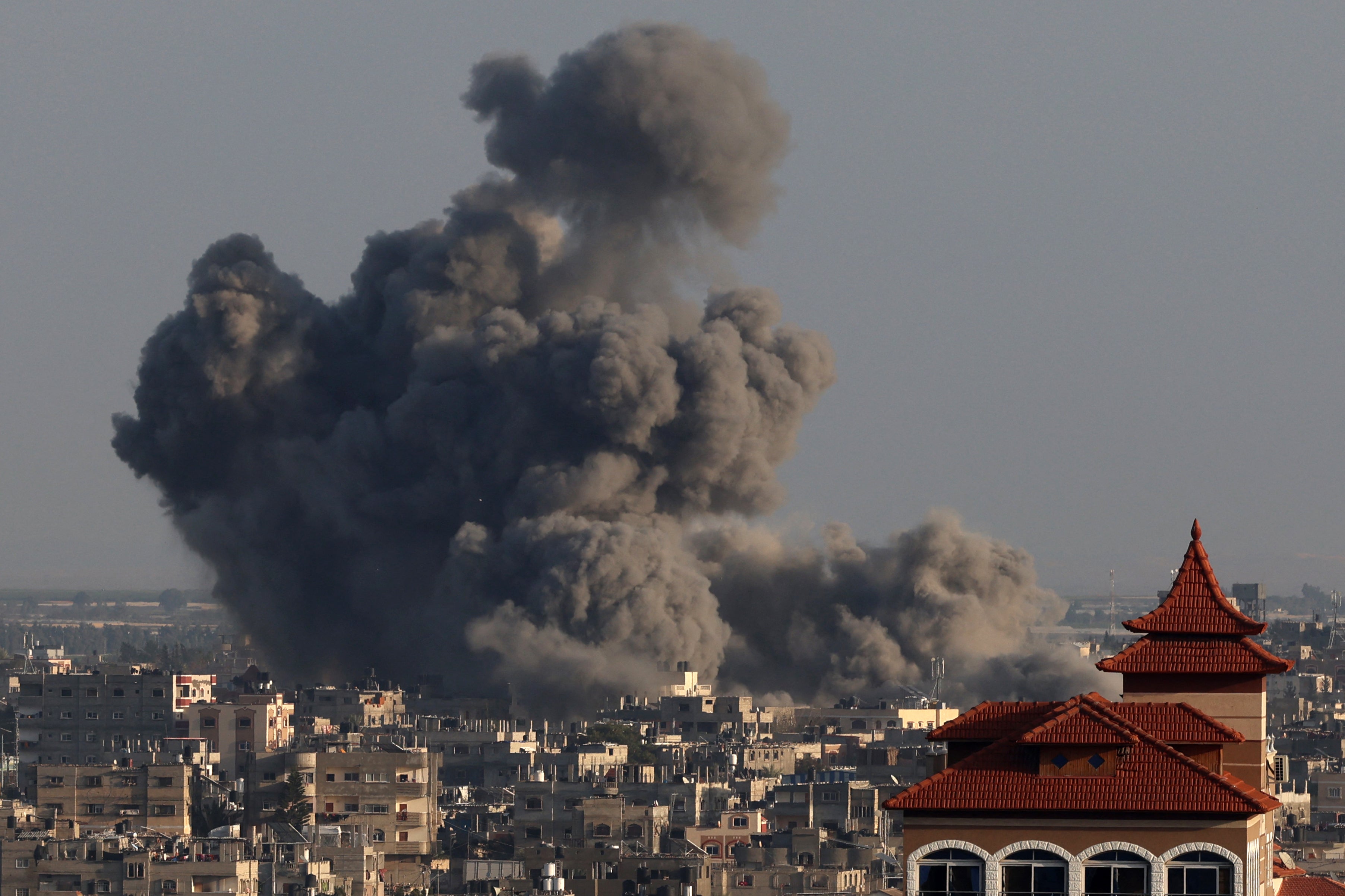 Smoke billowing over Khan Younis in the southern Gaza Strip, which Israeli forces have been striking