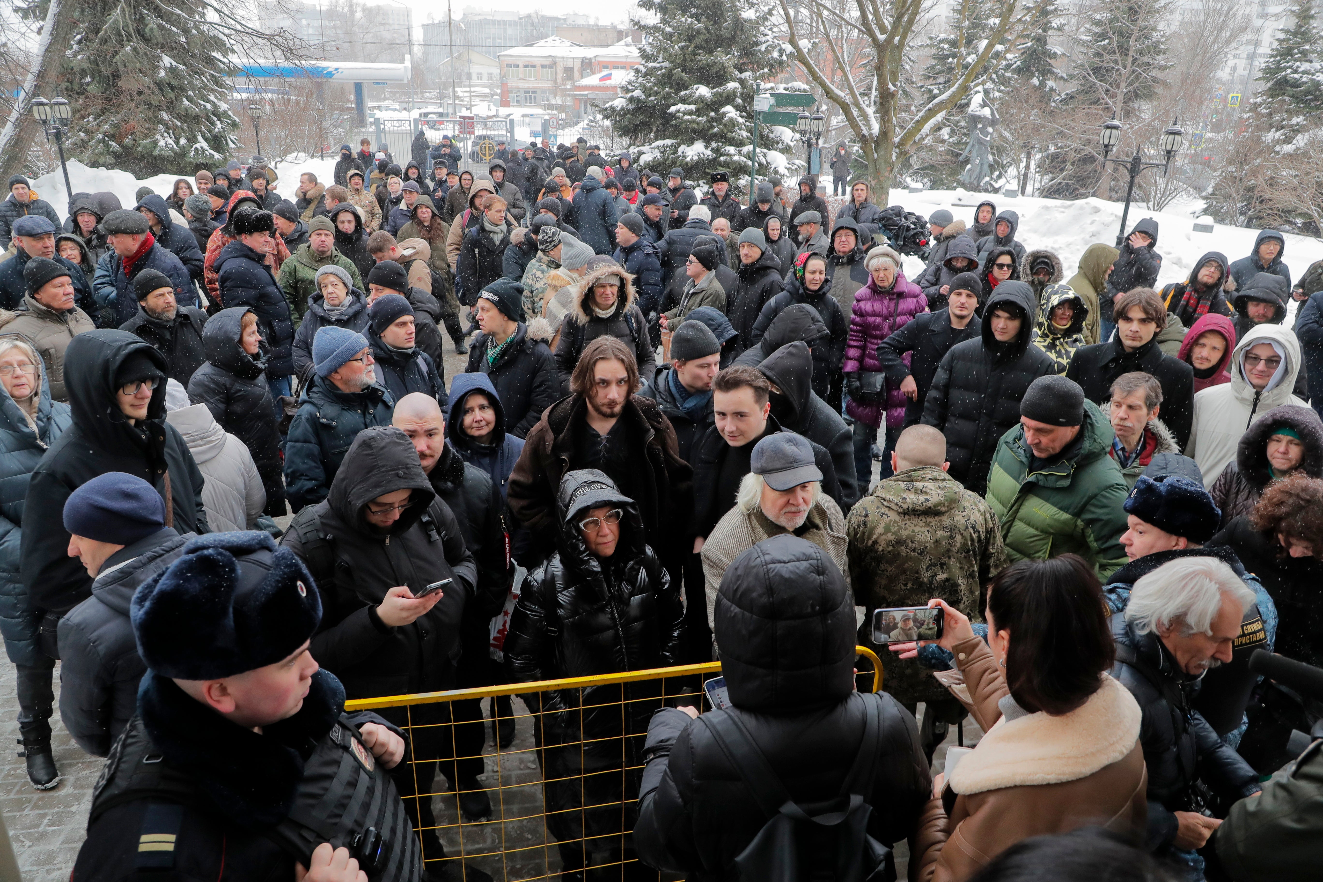 Dozens of Igor Girkin’s supporters gather outside the Moscow City Court on Thursday during his verdict