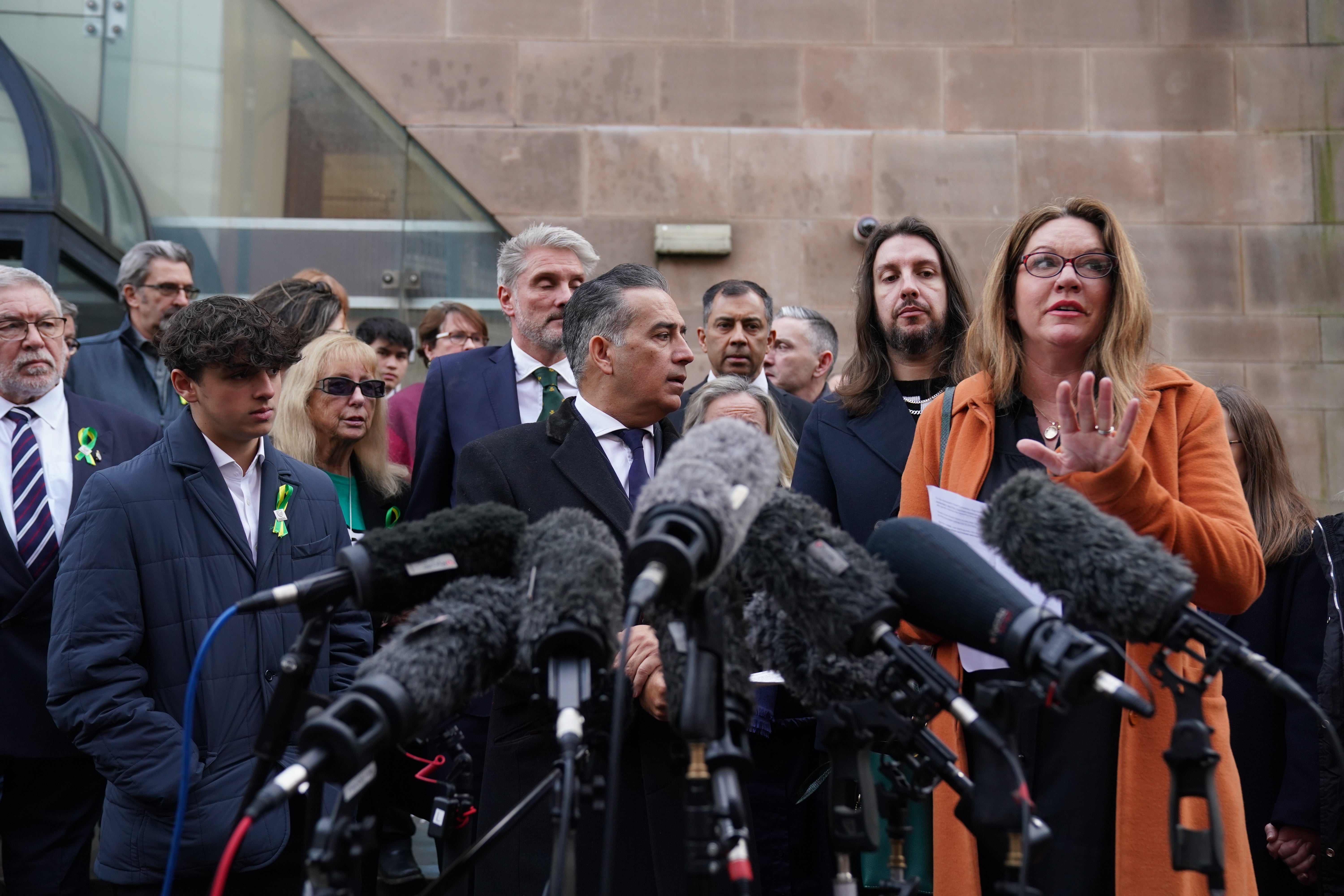 The families of Barnaby Webber, Grace O’Malley-Kumar and Ian Coates outside Nottingham Crown Court