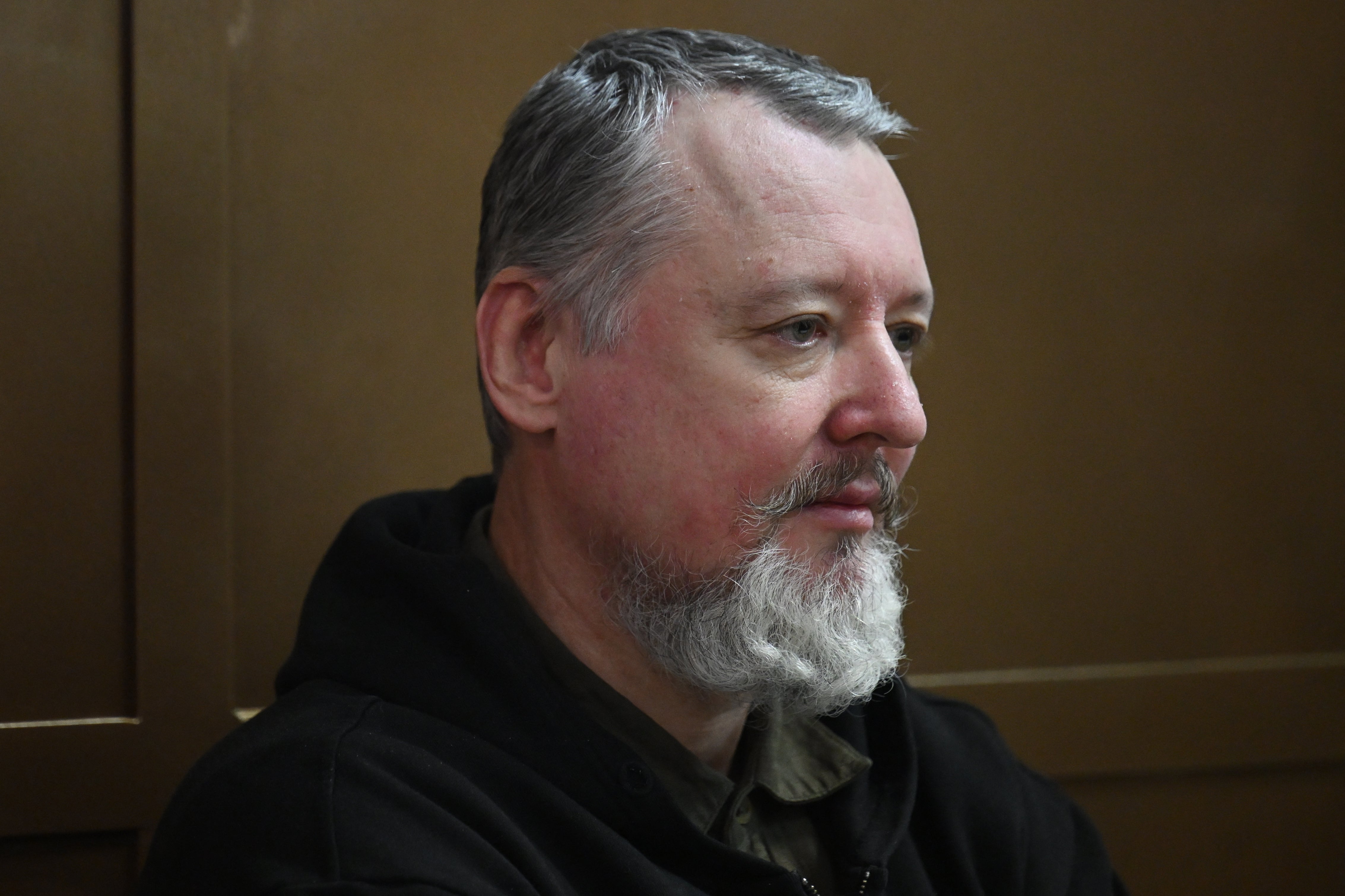 Igor Girkin (Strelkov), the former top military commander of the self-proclaimed "Donetsk People's Republic" and nationalist blogger charged with extremism, sits inside a glass defendants' cage ahead of his verdict hearing at the Moscow City Court